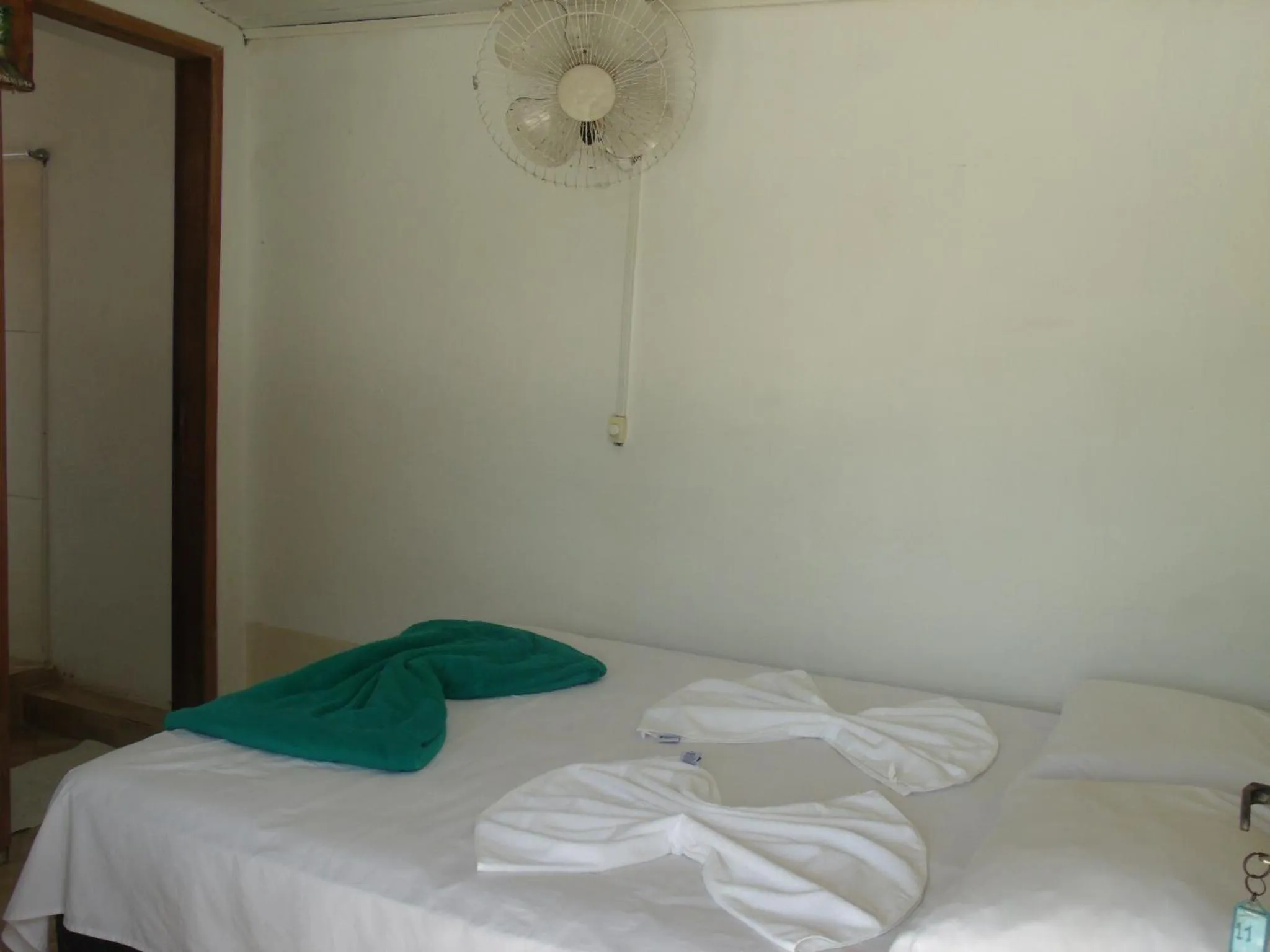 Bed in Pousada Edson