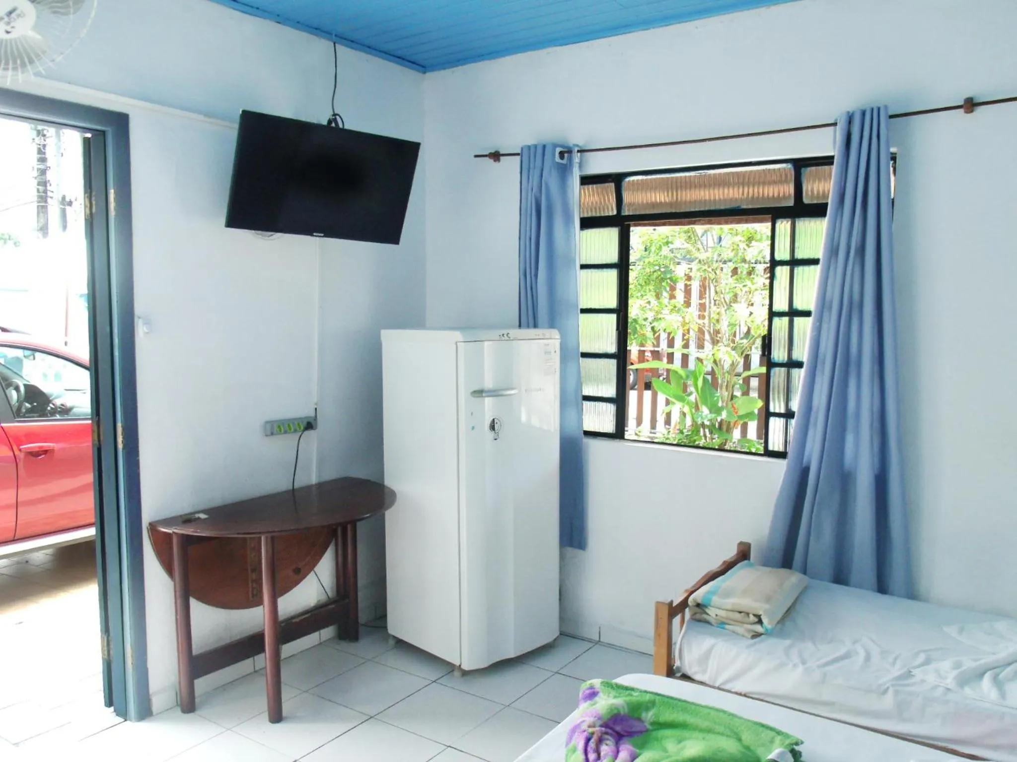 Bed in Pousada Edson