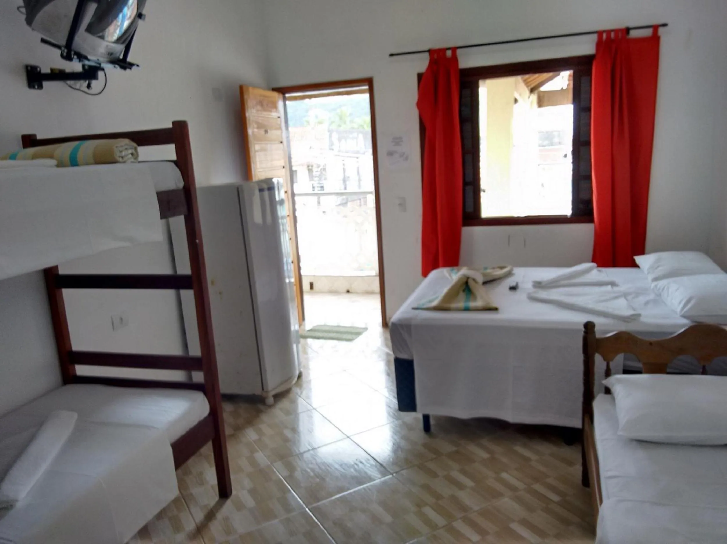 Bed in Pousada Edson