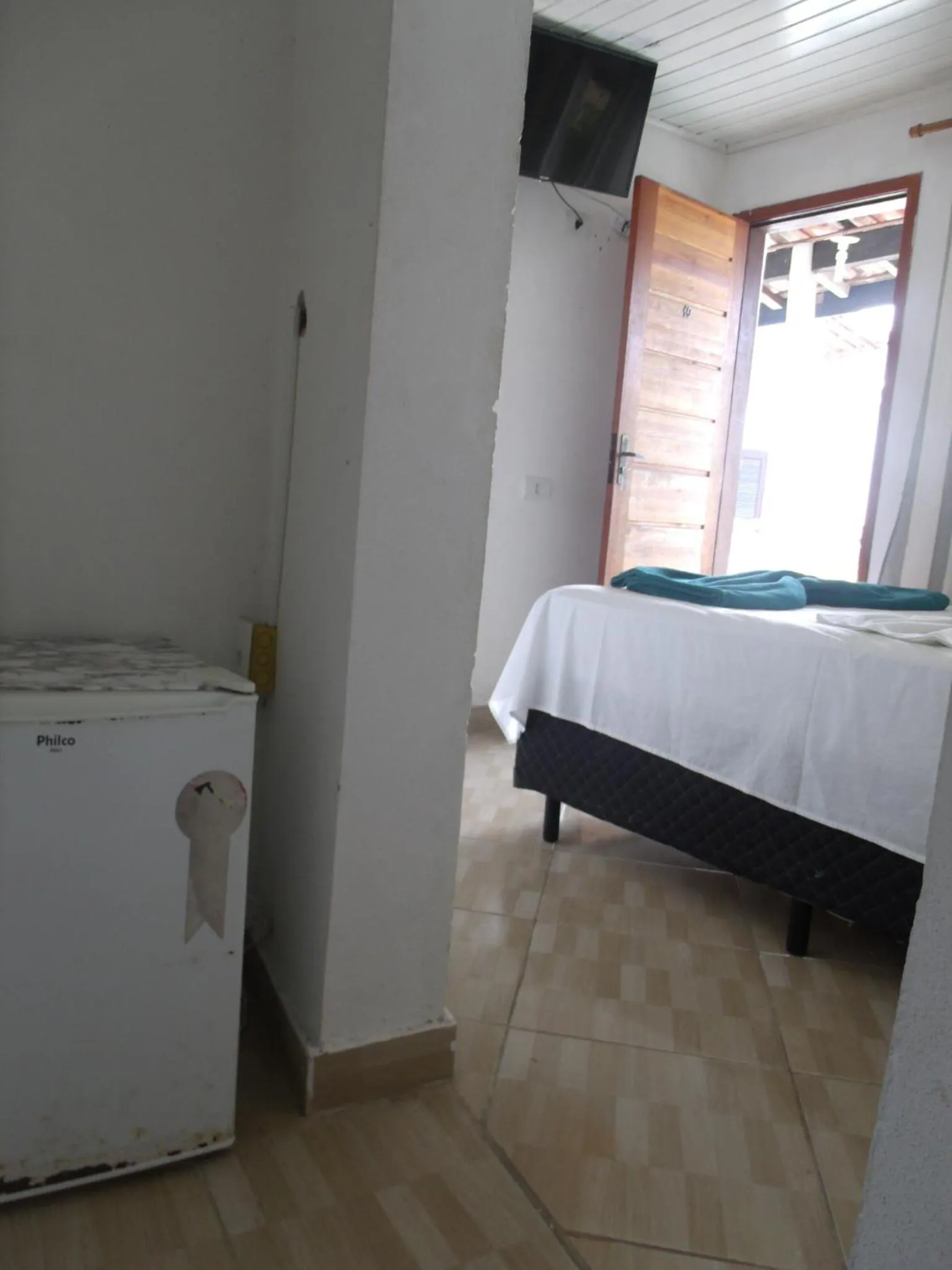 Bed in Pousada Edson