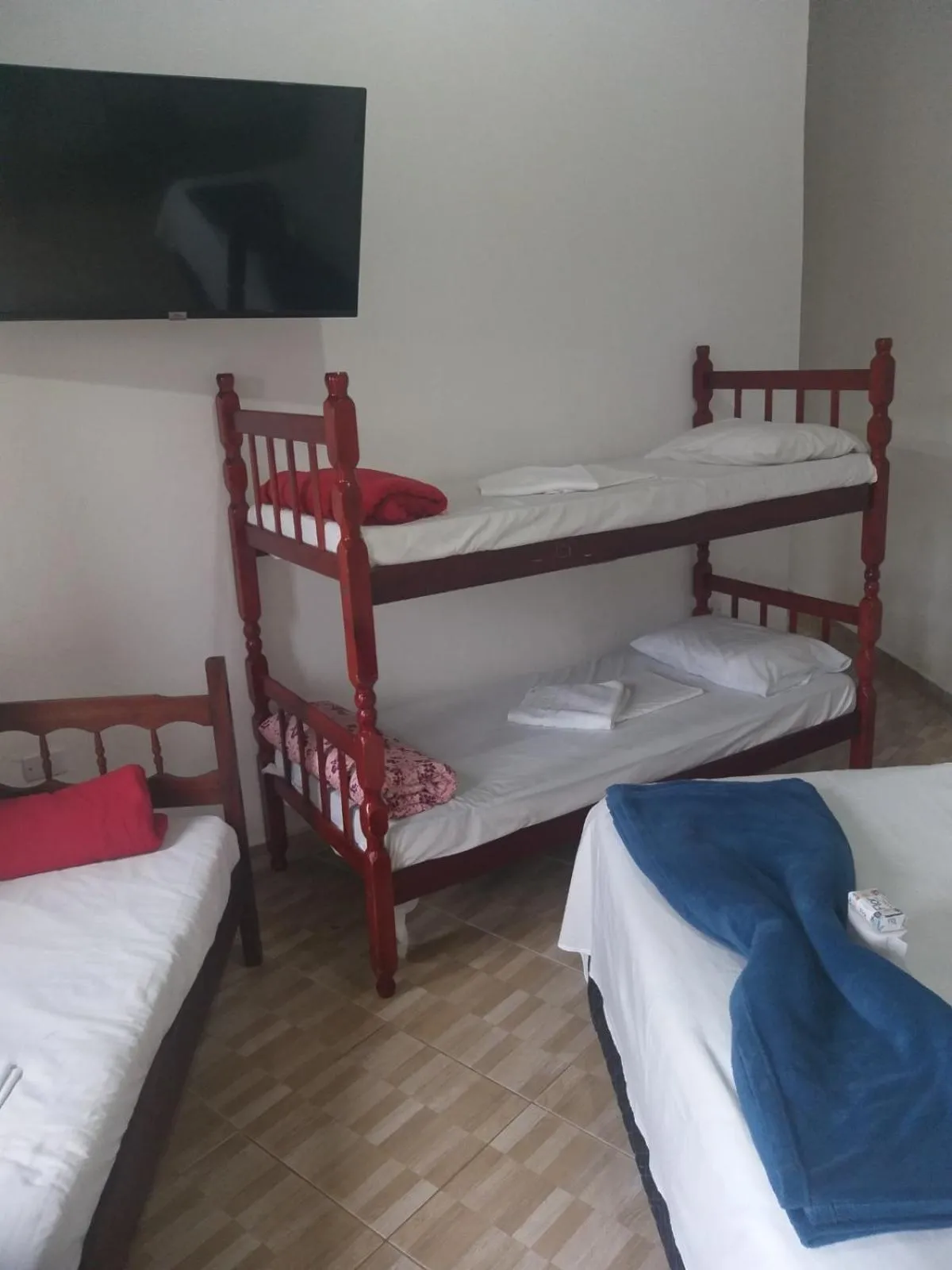 Bed in Pousada Edson