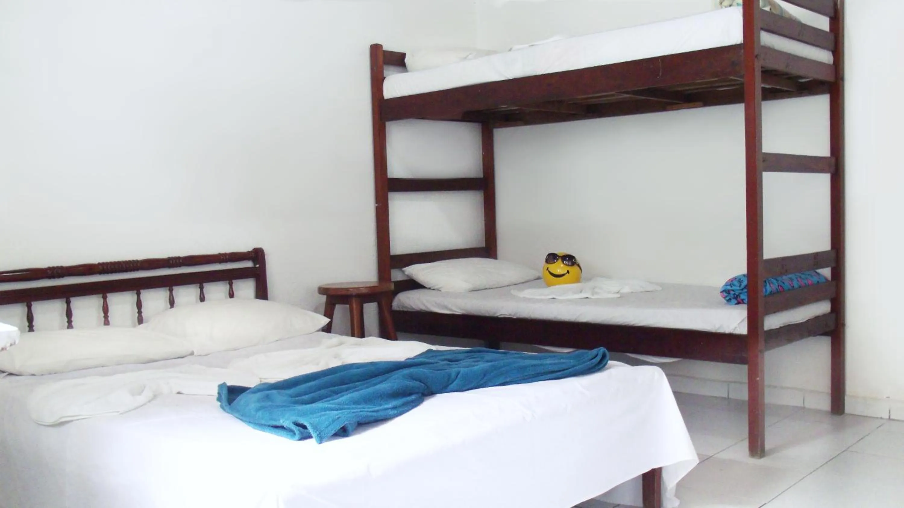 Bed in Pousada Edson