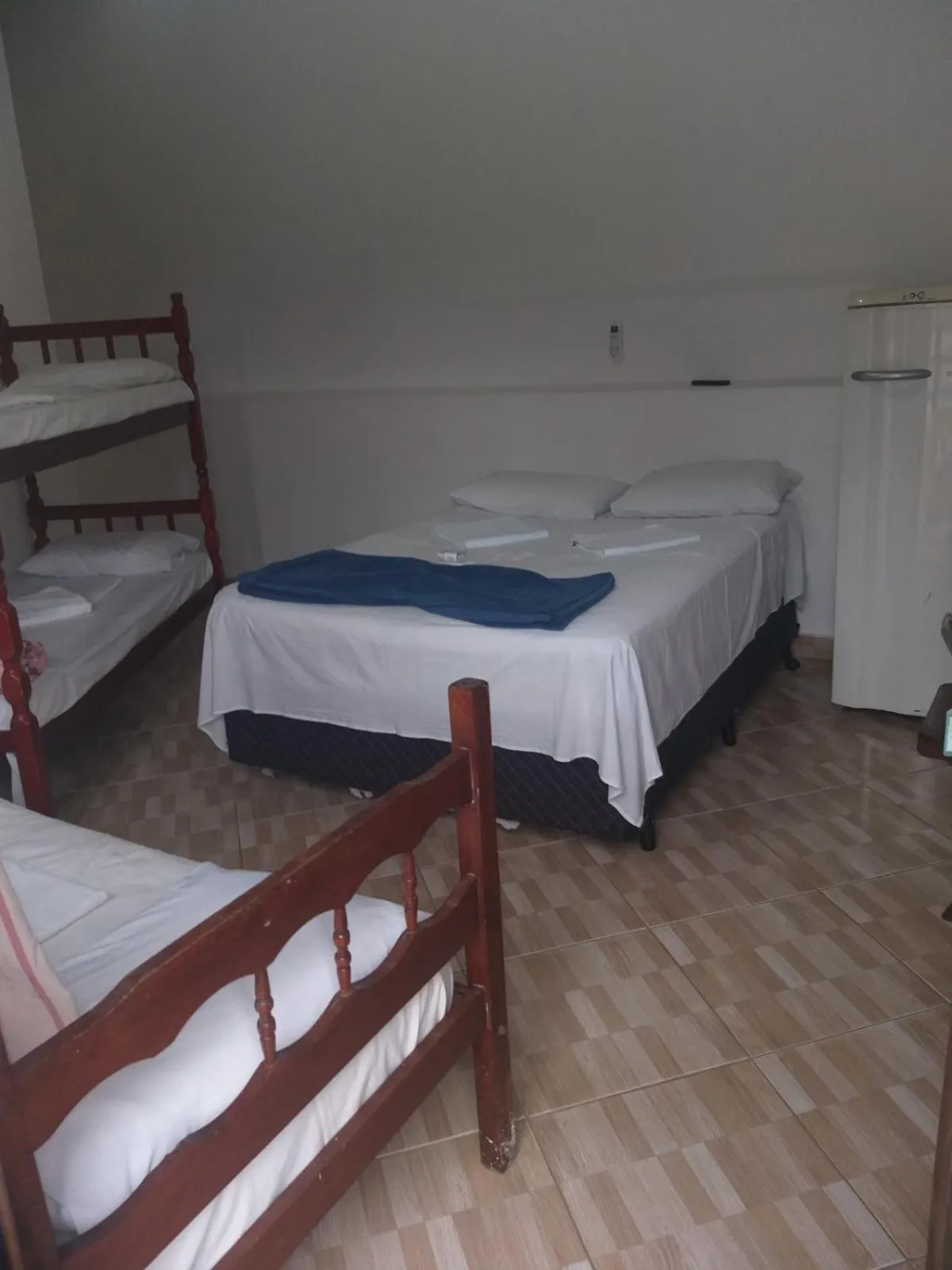 Bed in Pousada Edson