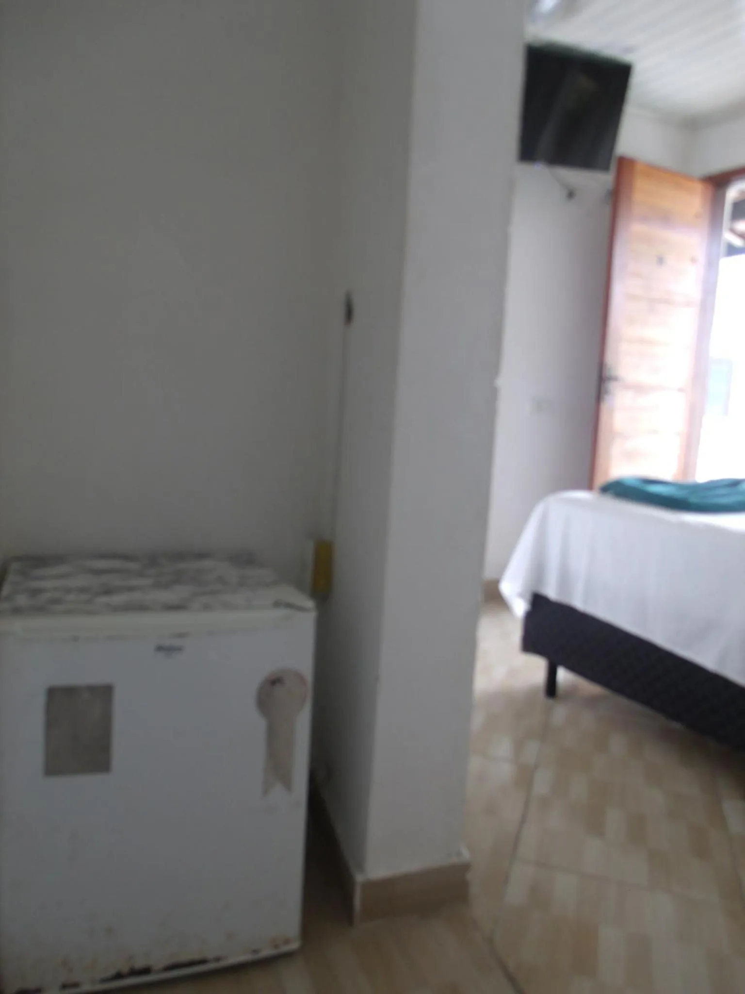 Bed in Pousada Edson