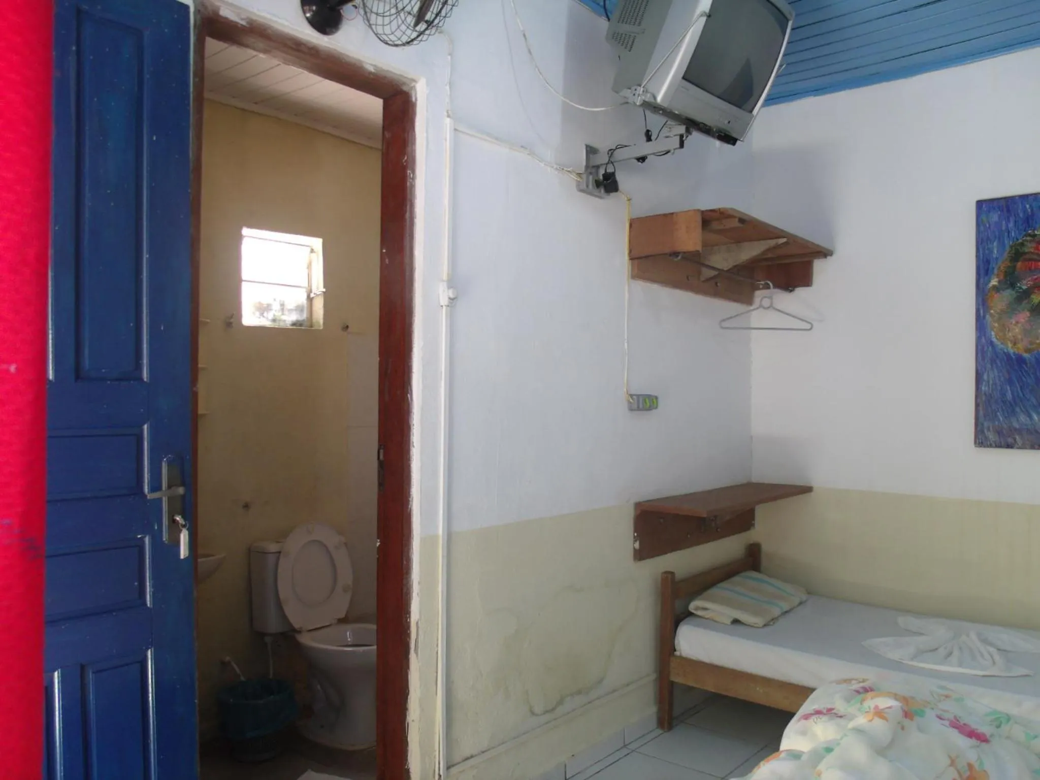 Bed in Pousada Edson