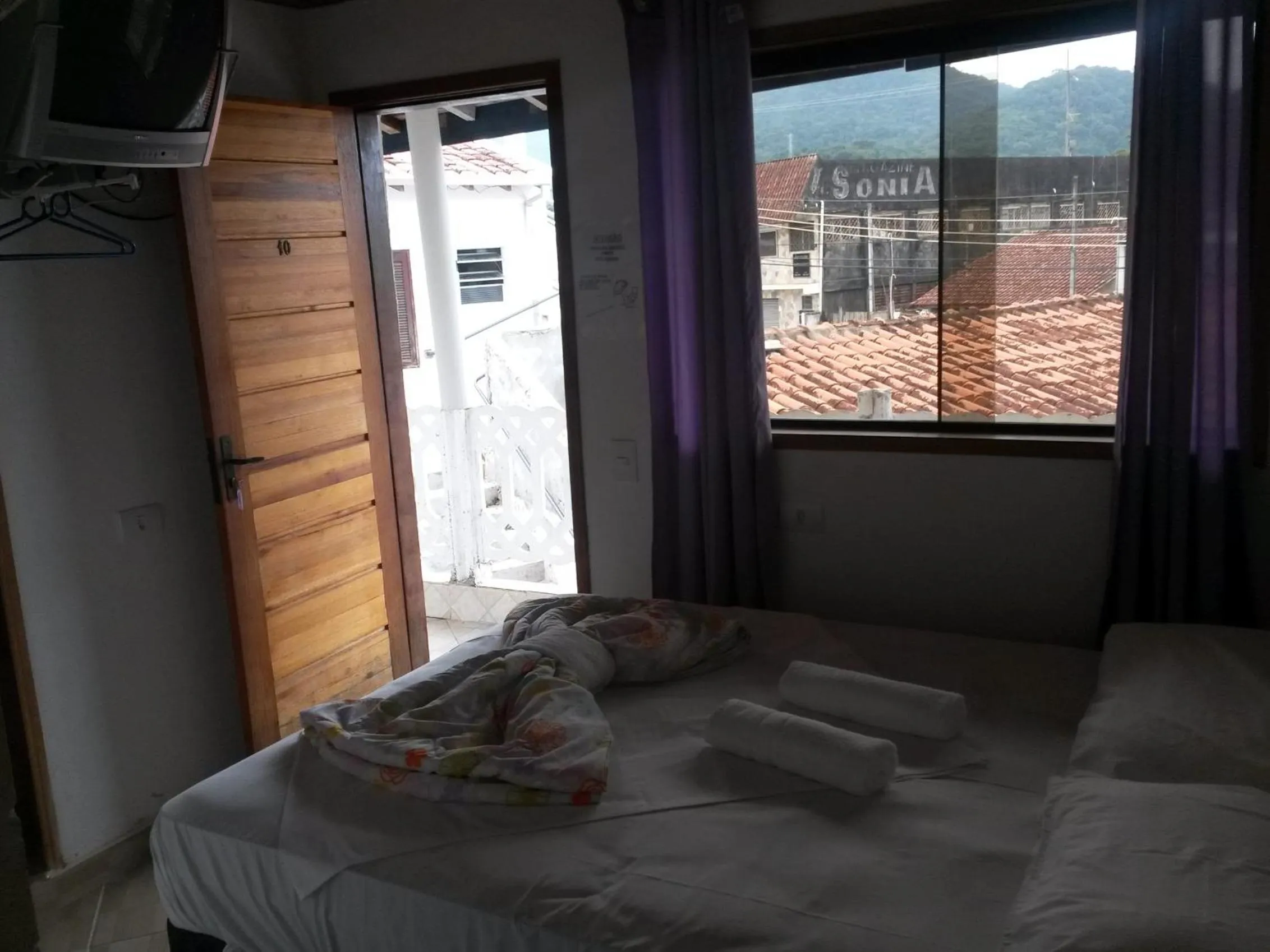 Bed in Pousada Edson