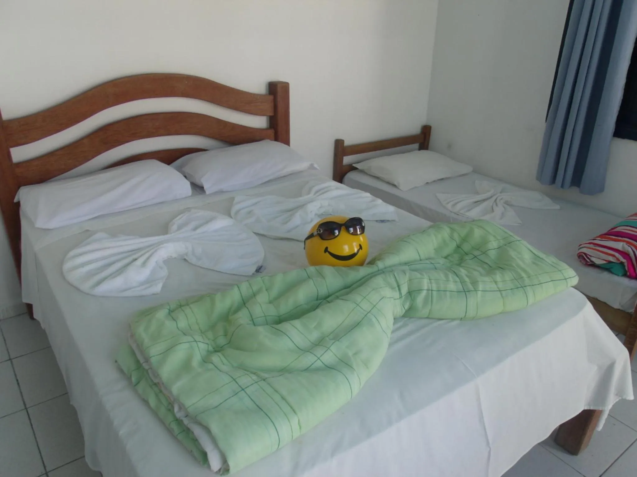 Bed in Pousada Edson