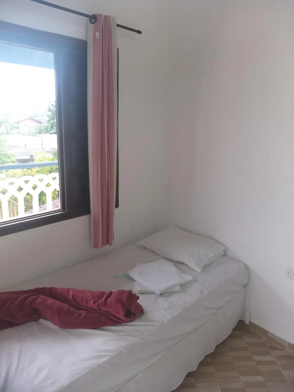 Bed in Pousada Edson