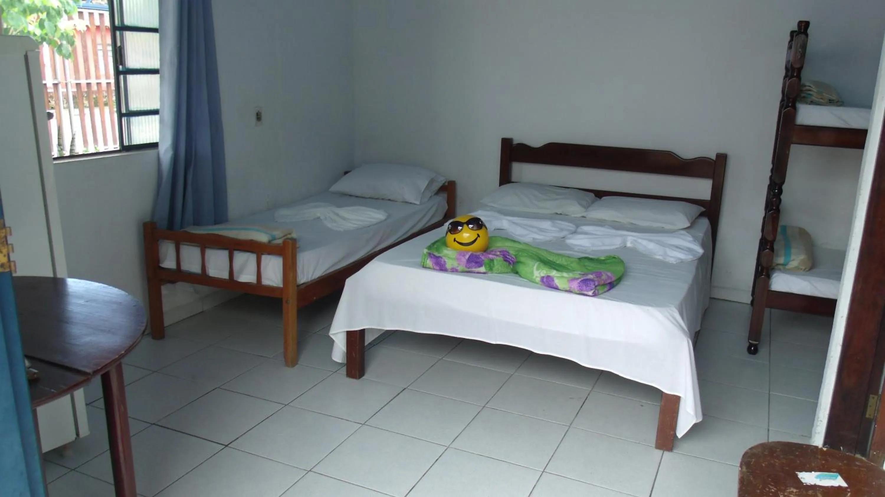 Bed in Pousada Edson