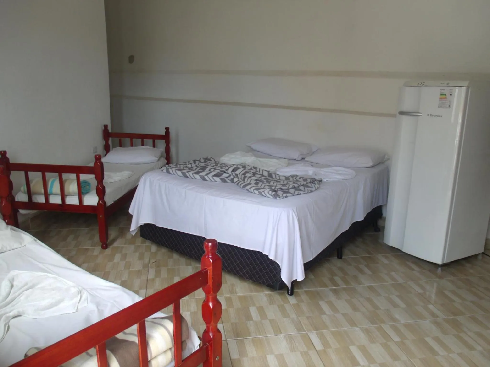 Bed in Pousada Edson