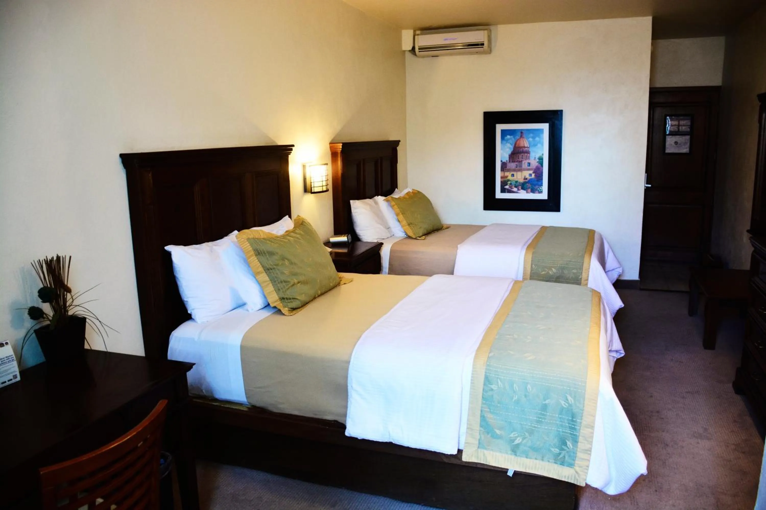 Bed in Hotel San Carlos Tequisquiapan