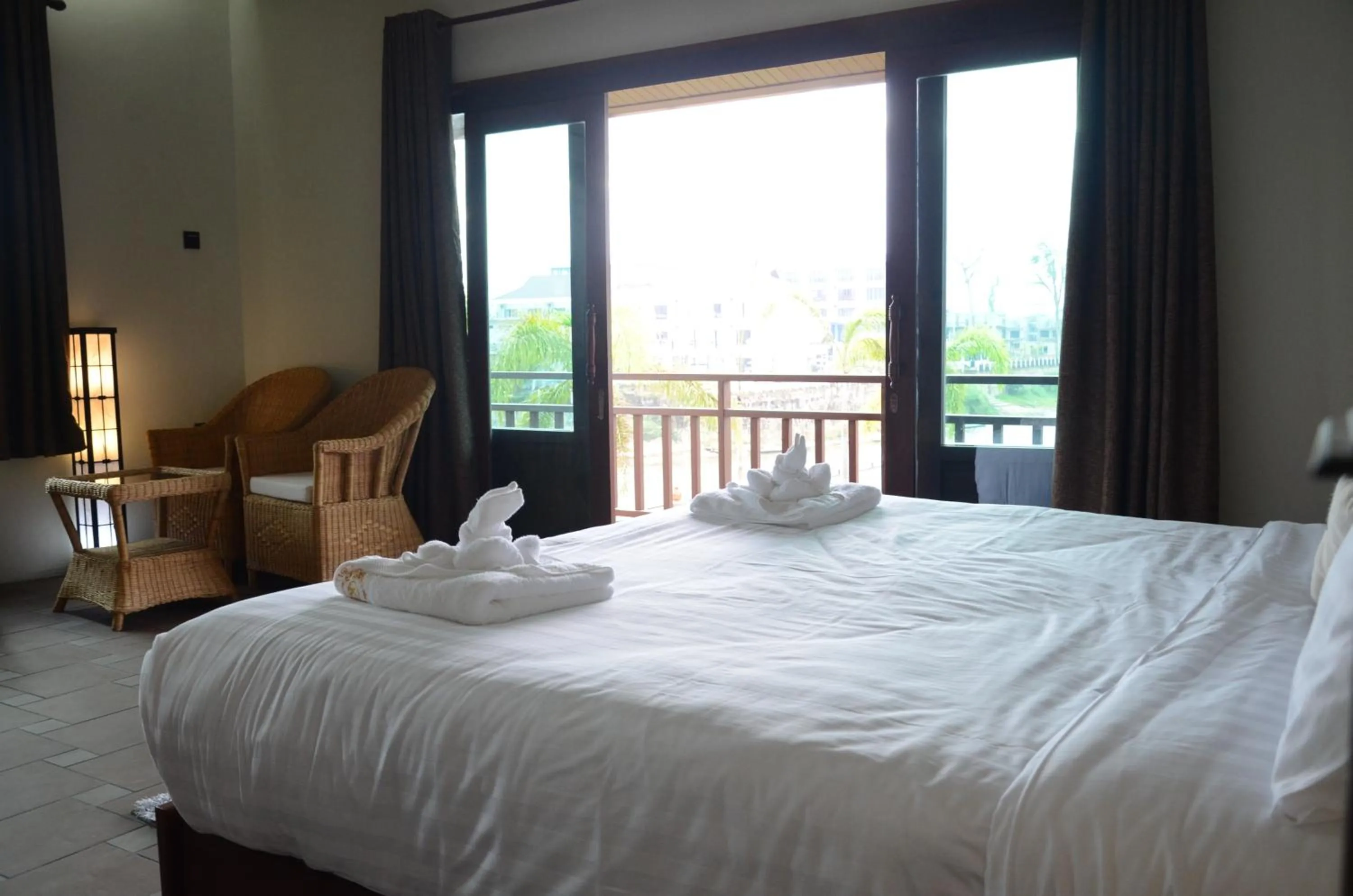 Bed in Saksiri Riverside Boutique Hotel