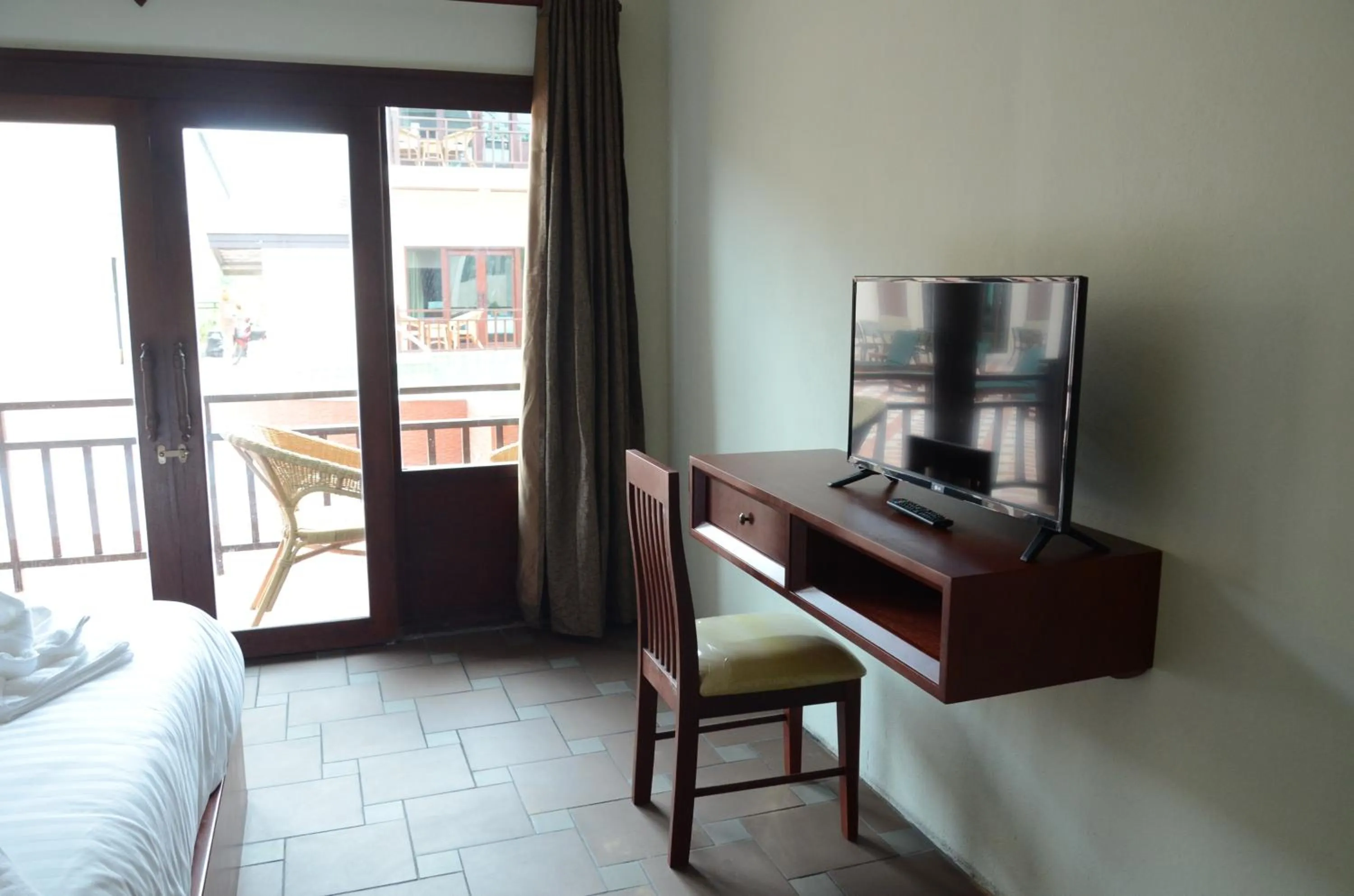 Bed in Saksiri Riverside Boutique Hotel