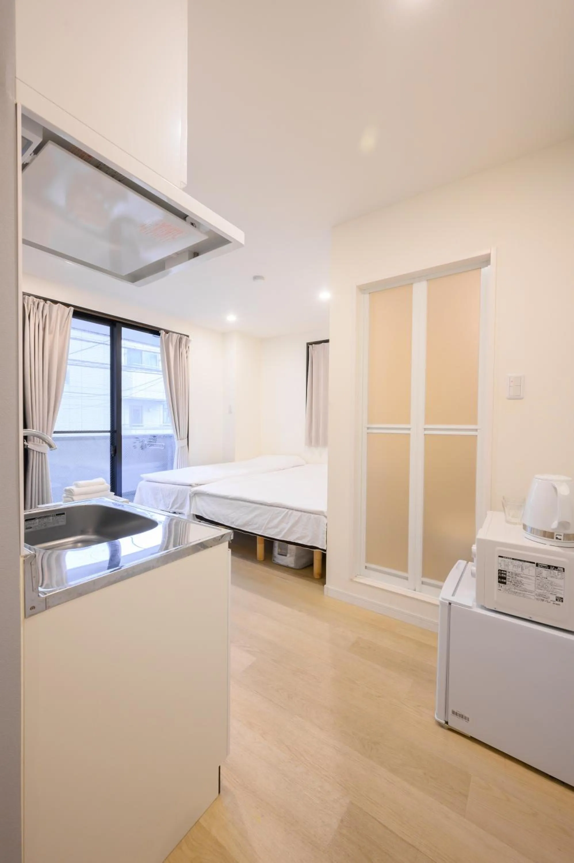 Bed in Oku Apartment