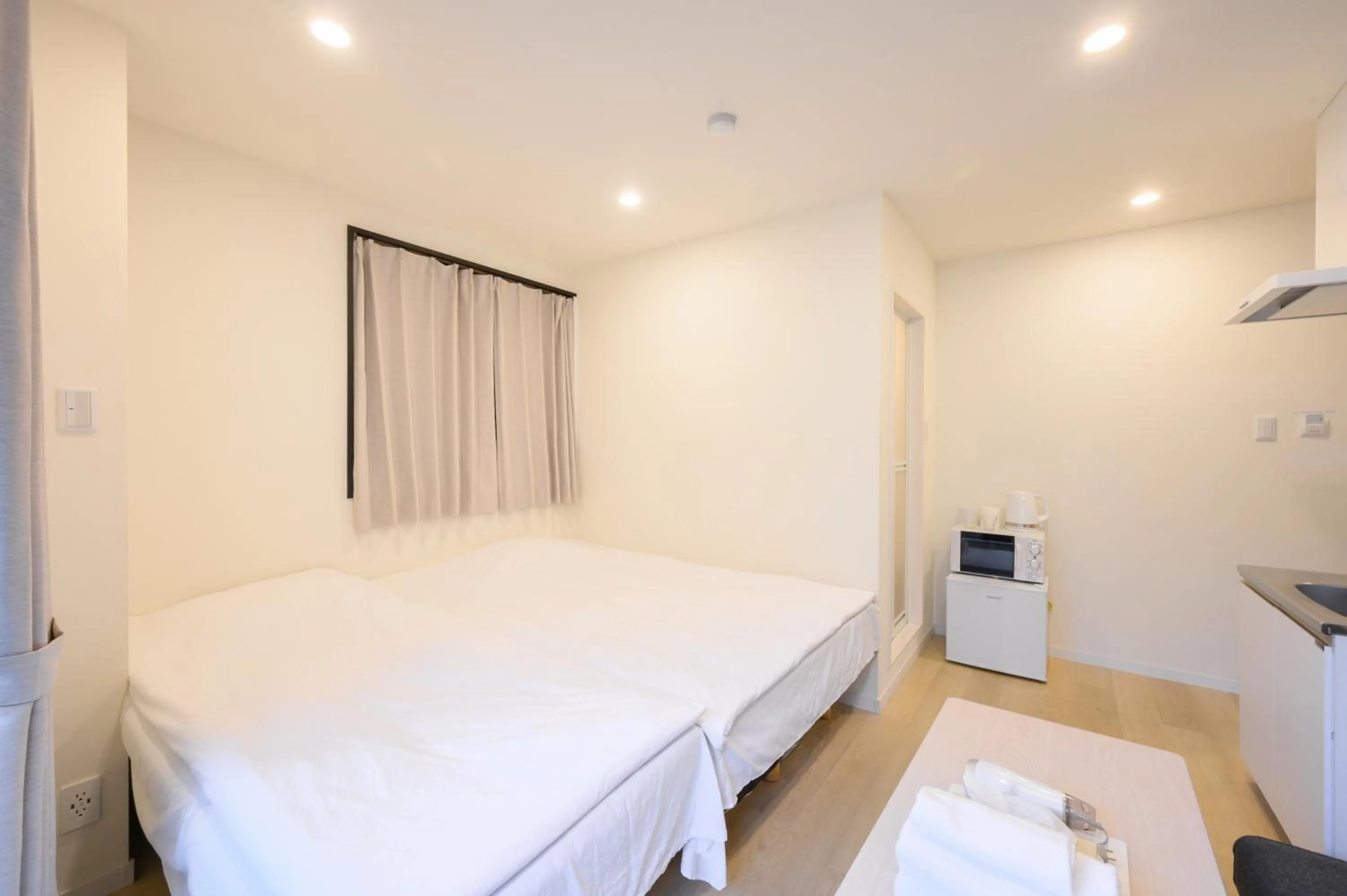 Bed in Oku Apartment