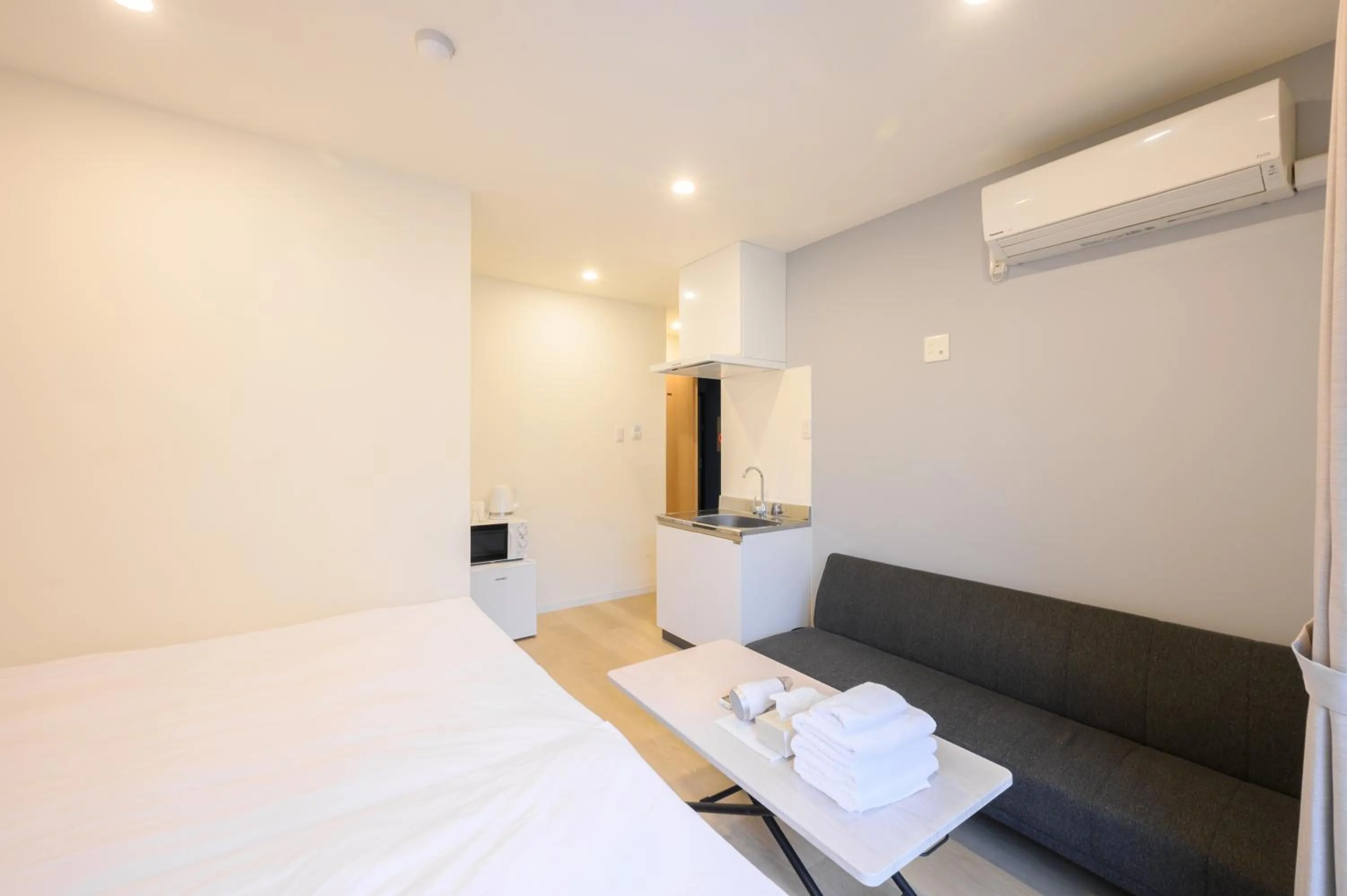 Bed in Oku Apartment