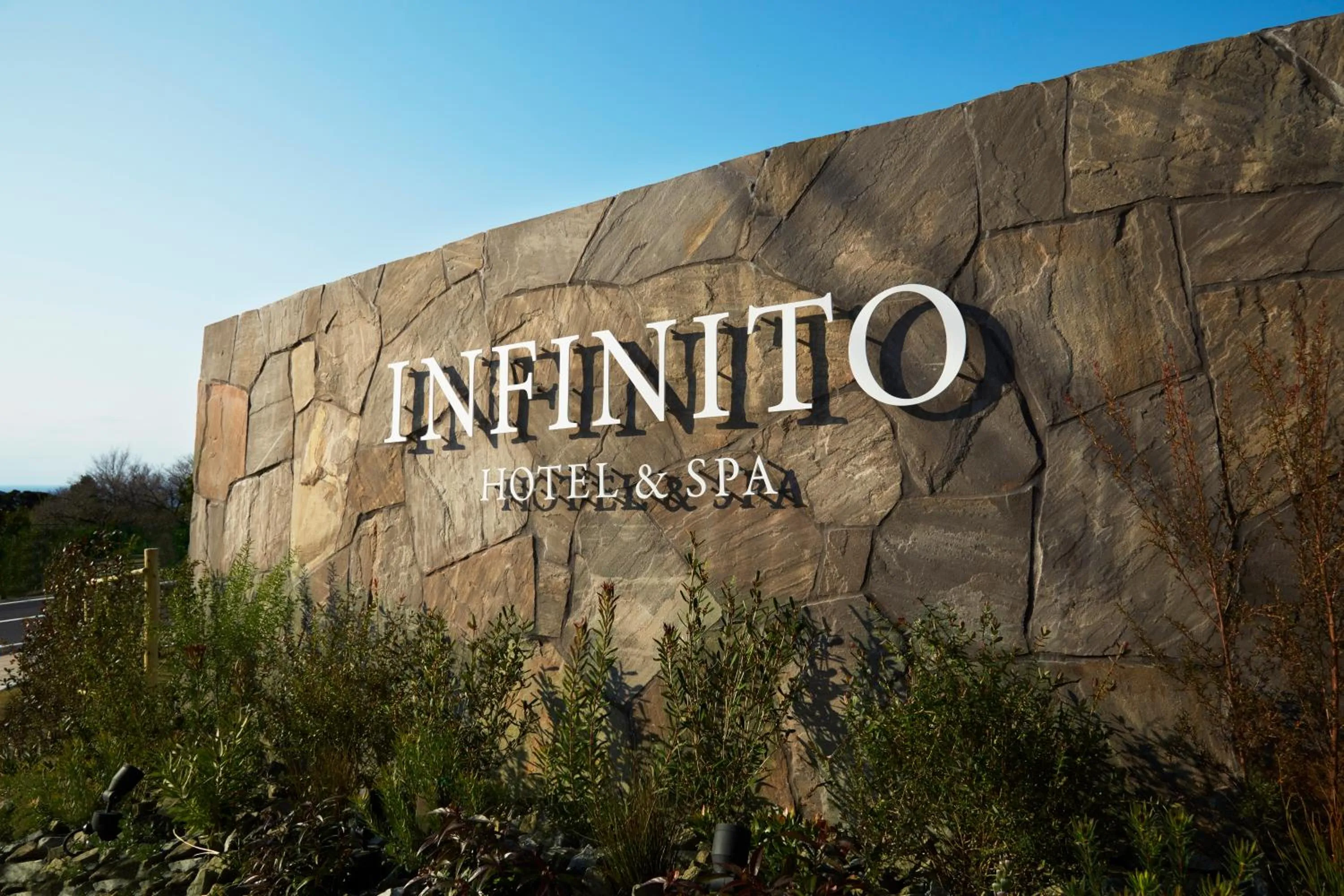 Property logo or sign in Infinito Hotel and Spa