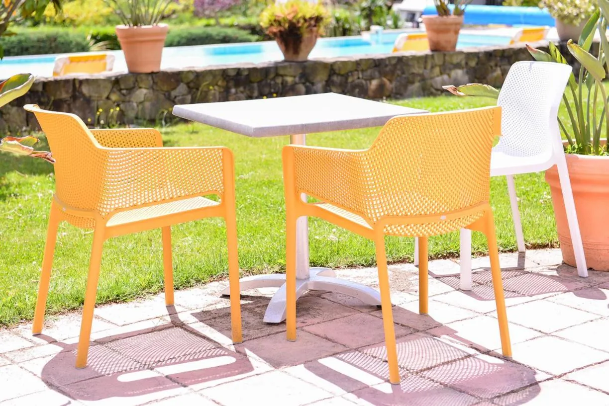 Patio in Logis Hôtel Restaurant Le Chêne Vert