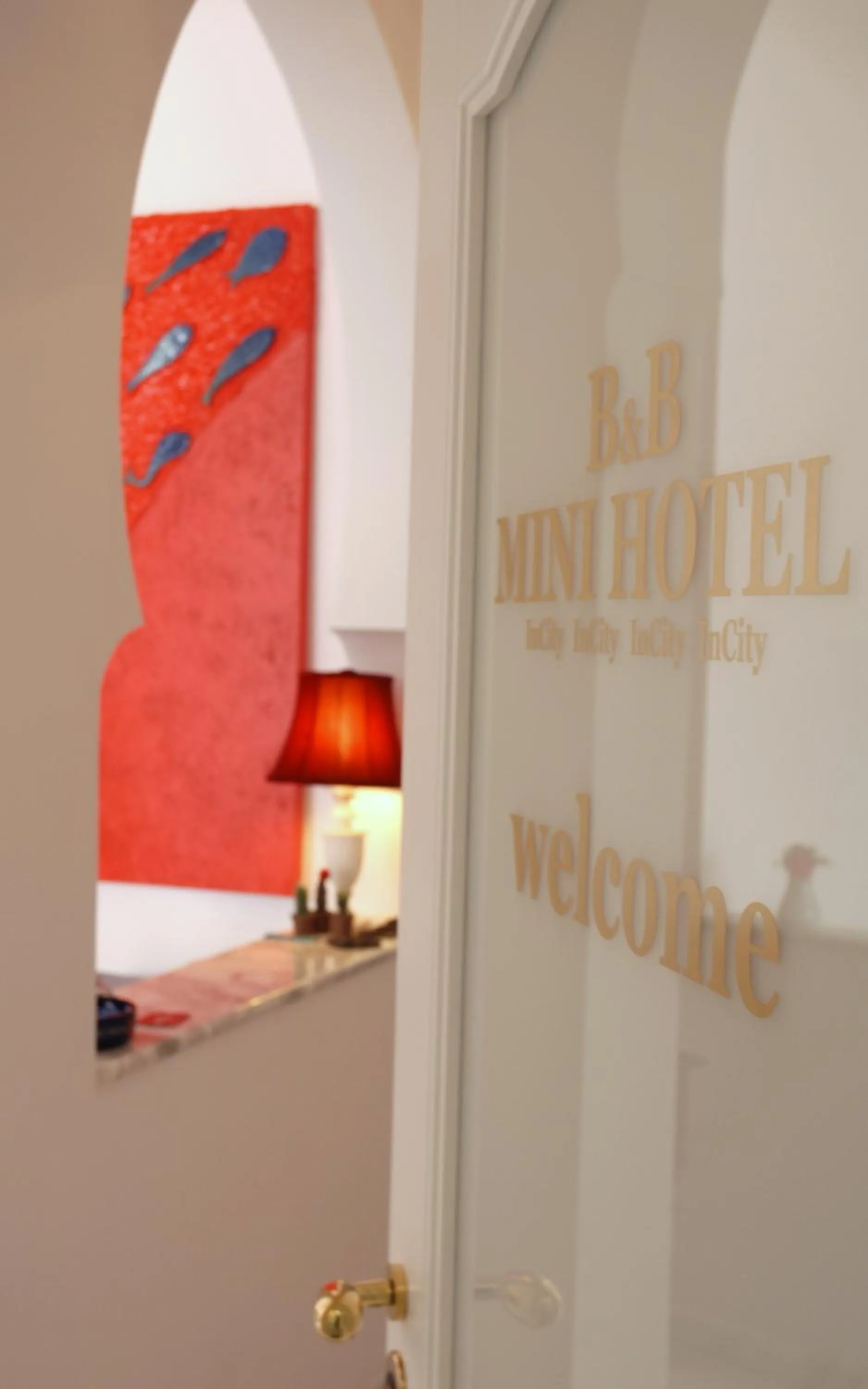 Property logo or sign in B&B Mini Hotel Incity-close train station and port-