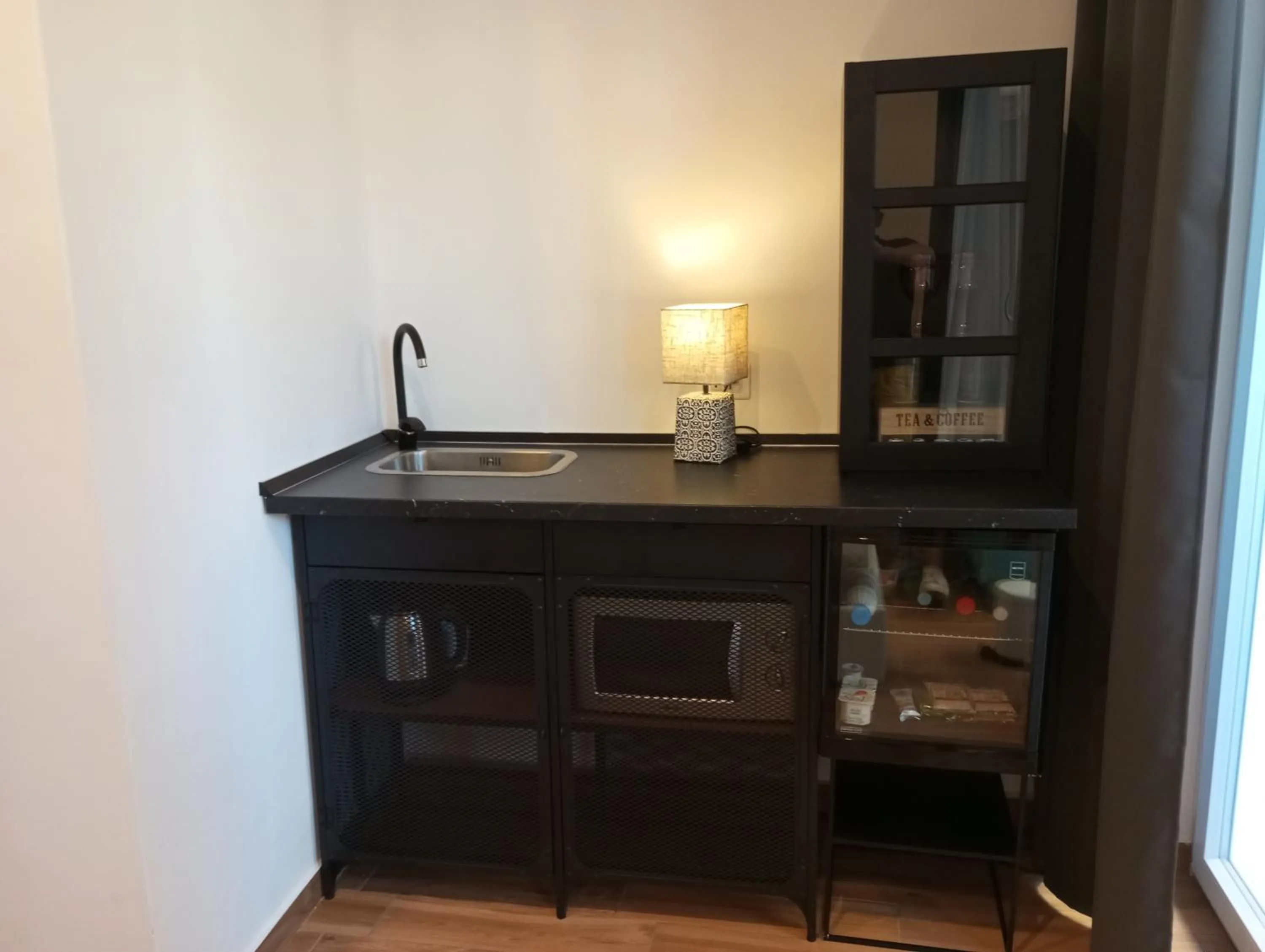 Kitchen or kitchenette in B&B Mini Hotel Incity-close train station and port-