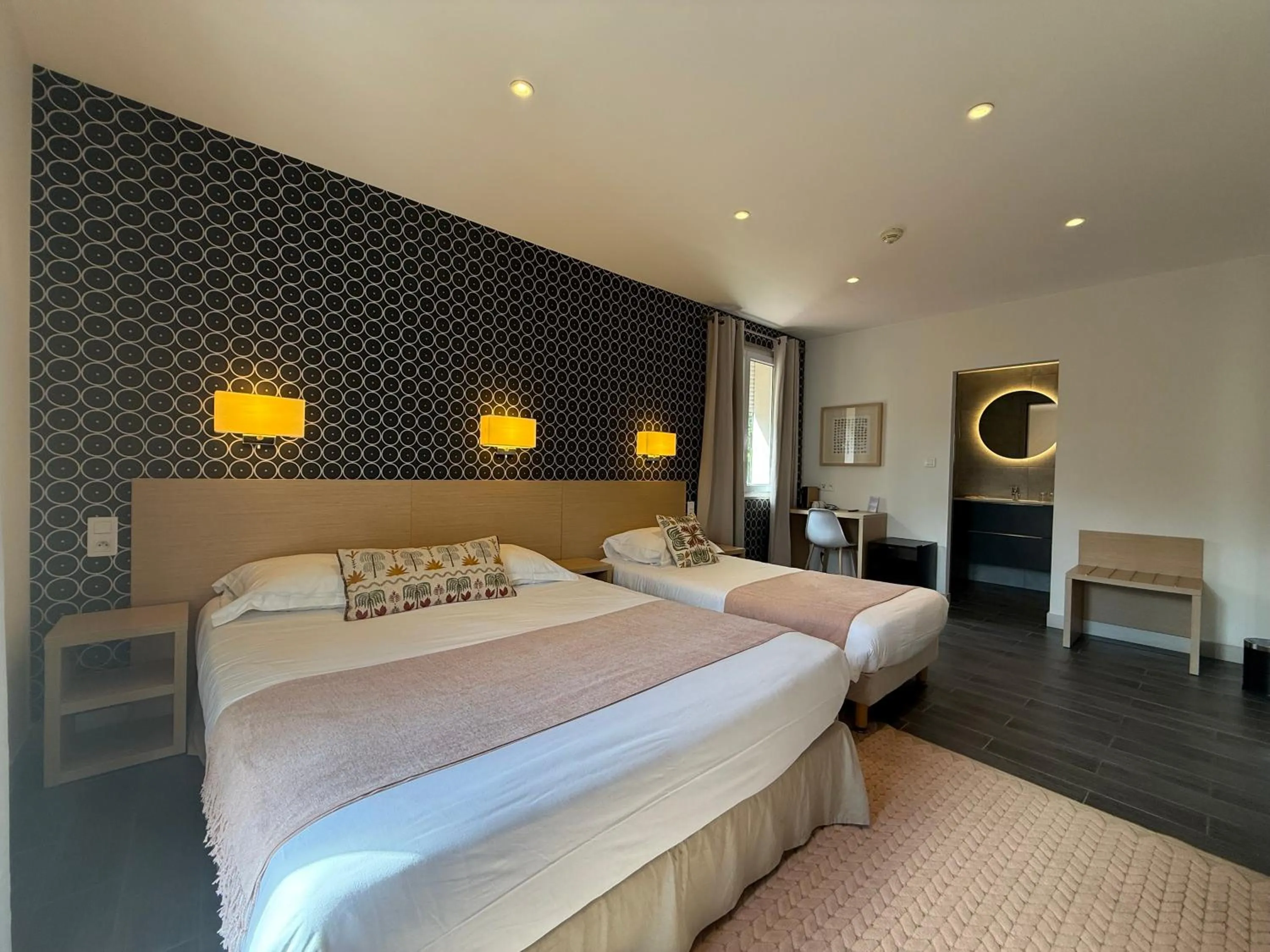 Photo of the whole room, Bed in Hôtel Le Mistral