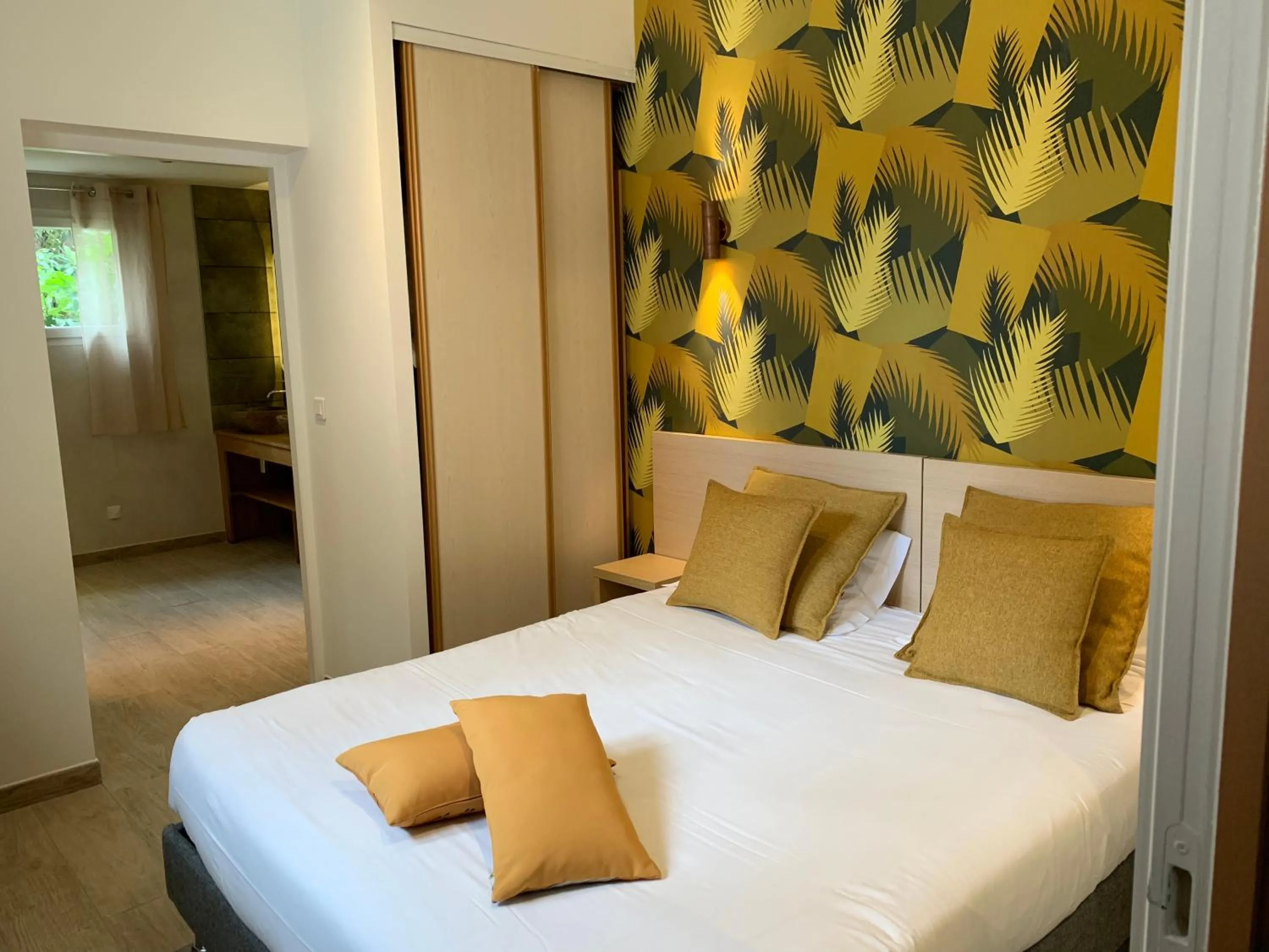 Photo of the whole room, Bed in Hôtel Le Mistral