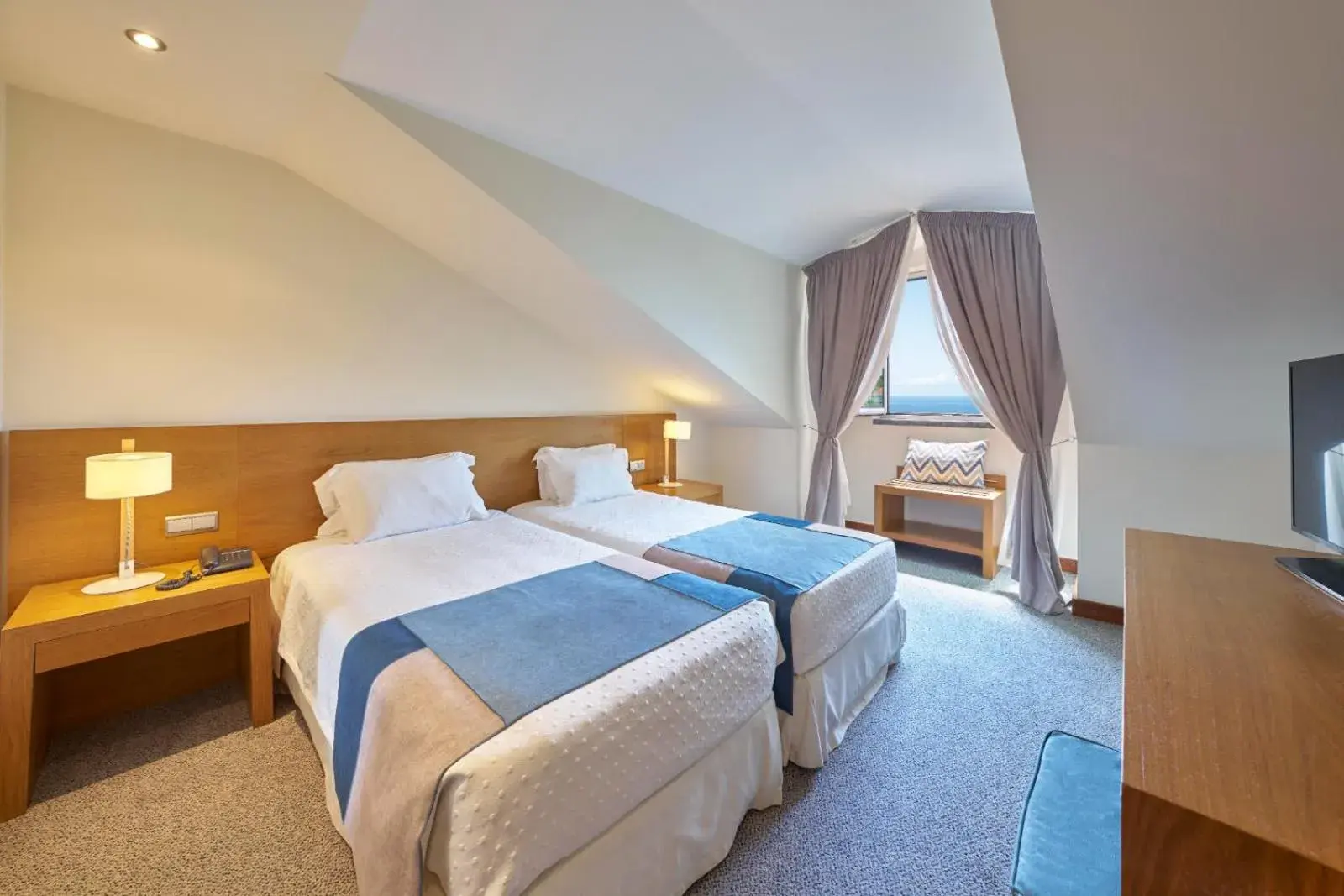 Twin Family Suite with Sea View in Hotel Do Caracol Twin Family Suite with Sea View in Hotel Do Caracol