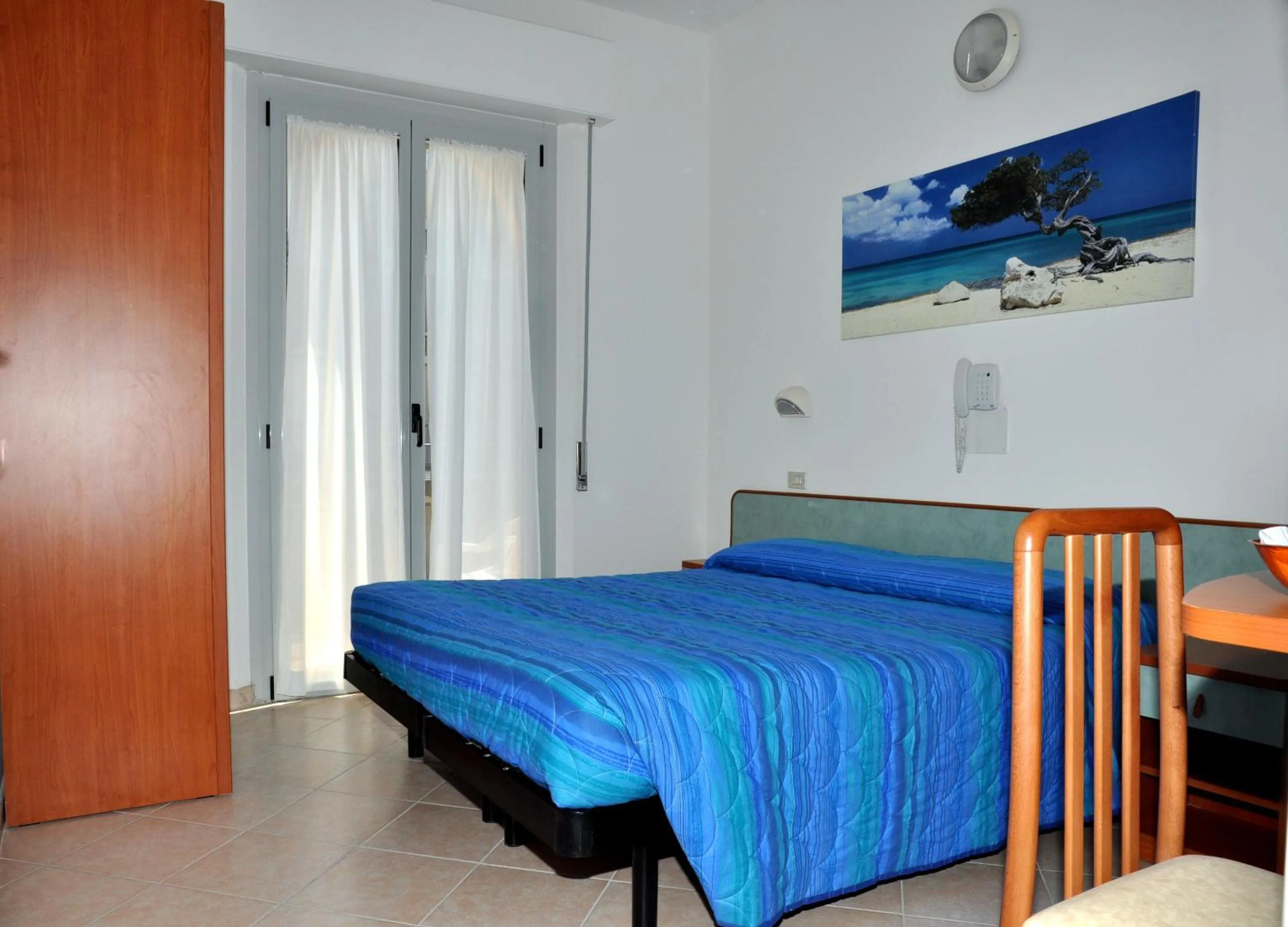 Bedroom in Hotel Holiday Beach