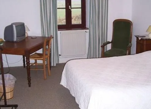 Photo of the whole room, Bed in Ferme du Montheu