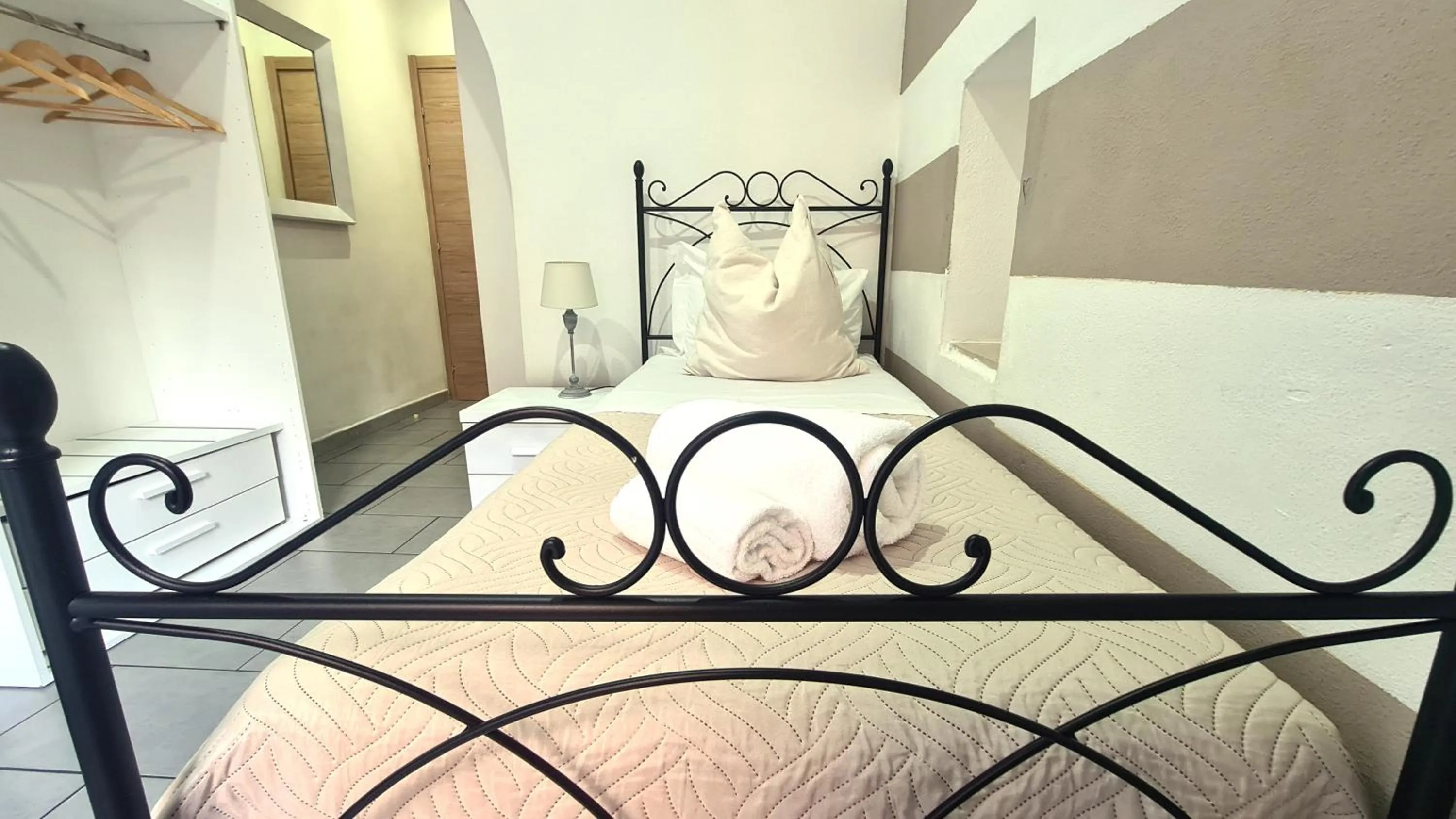 Bed in Affittacamere Lunamar