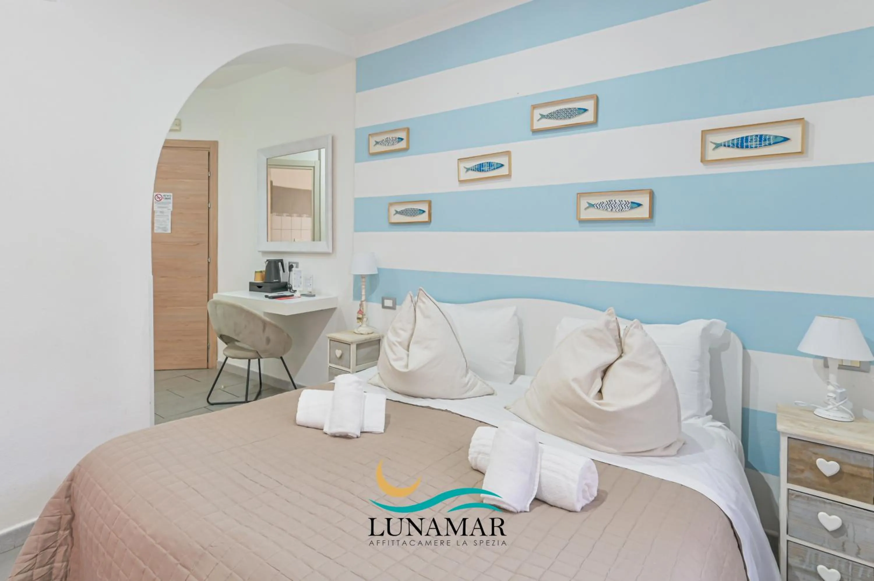 Bed in Affittacamere Lunamar