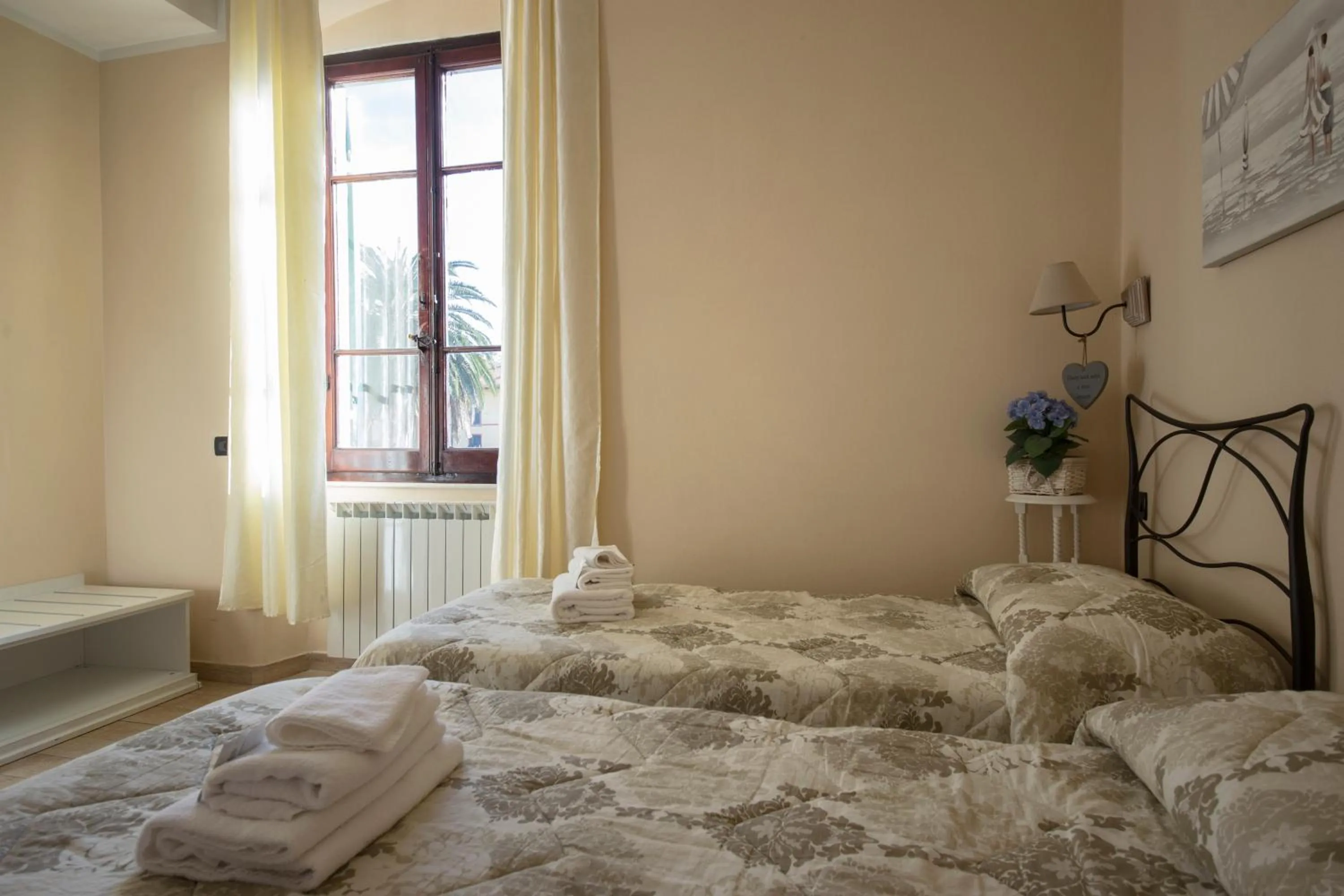 Bed in Affittacamere Lunamar