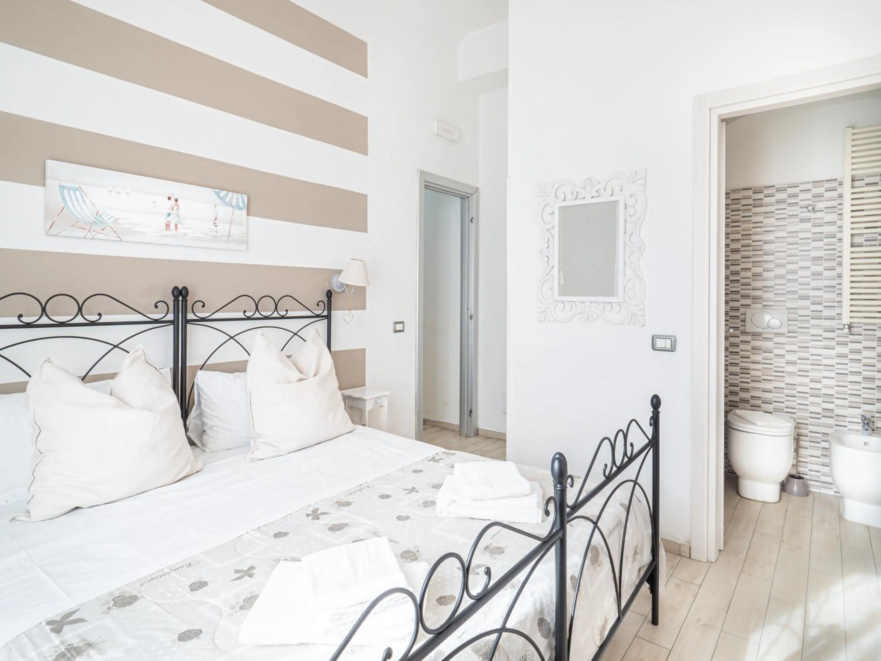 Bed in Affittacamere Lunamar