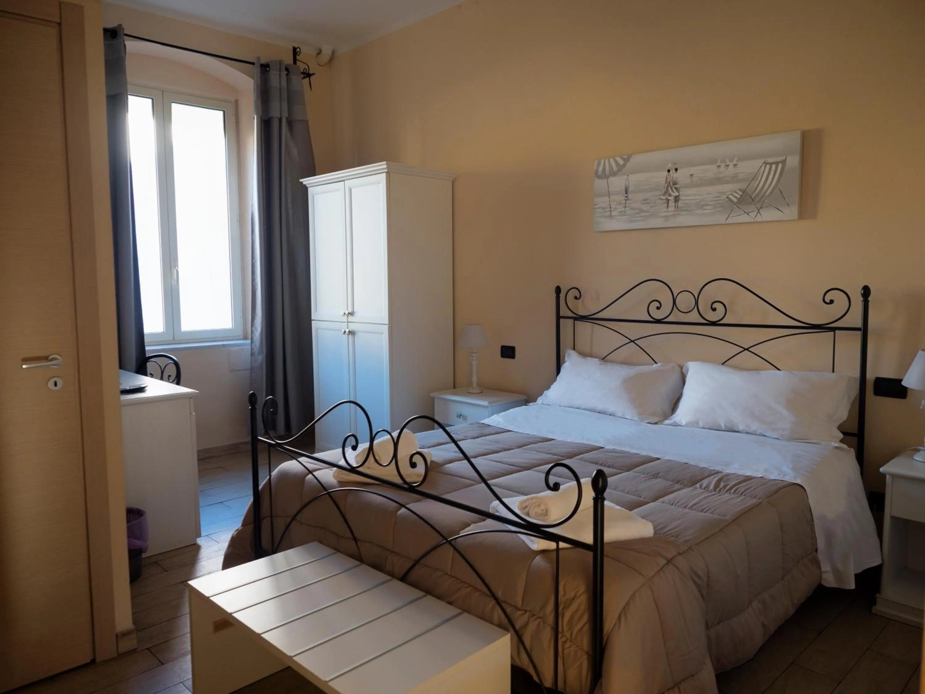 Bed in Affittacamere Lunamar