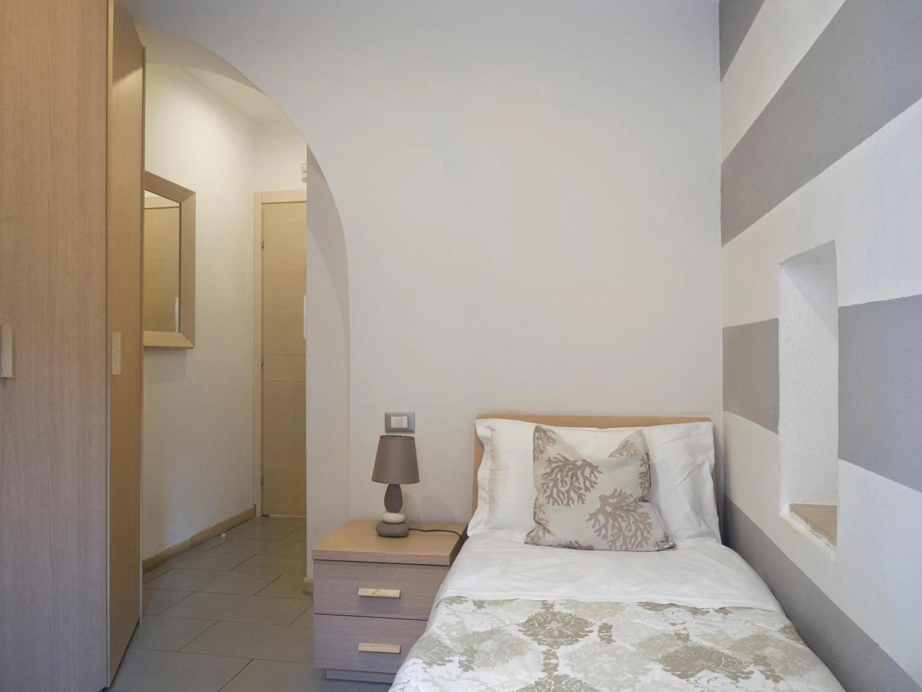 Bed in Affittacamere Lunamar