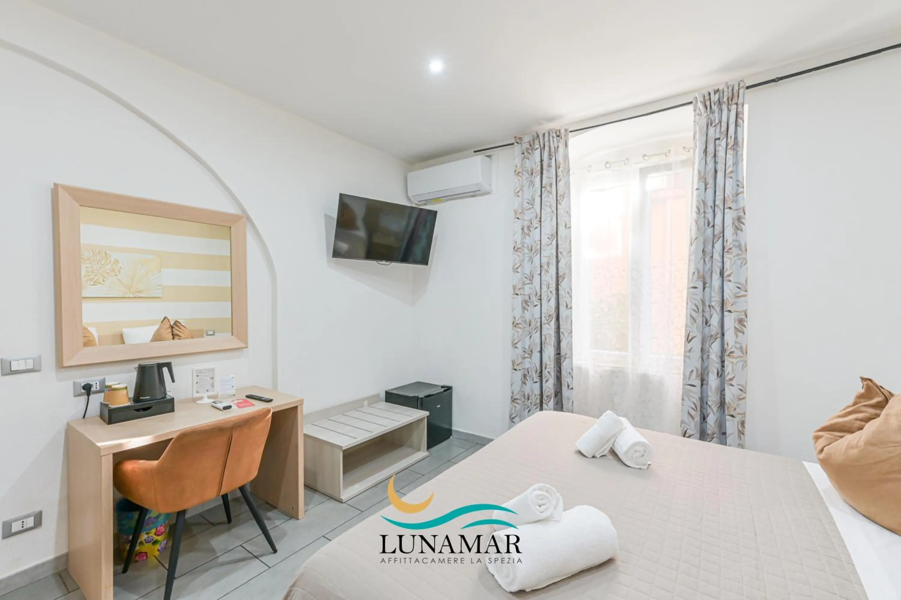 Bed in Affittacamere Lunamar