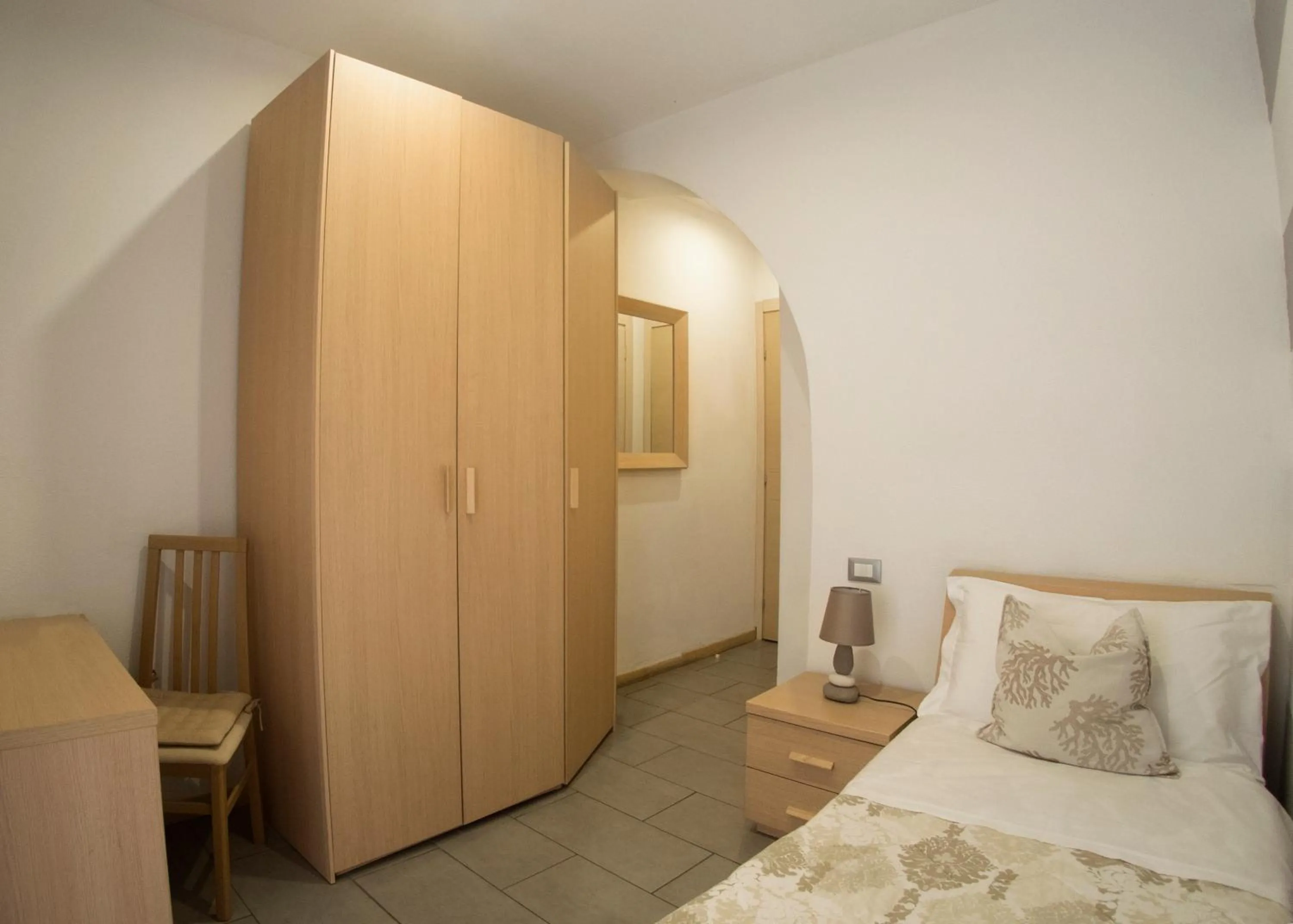 Bed in Affittacamere Lunamar