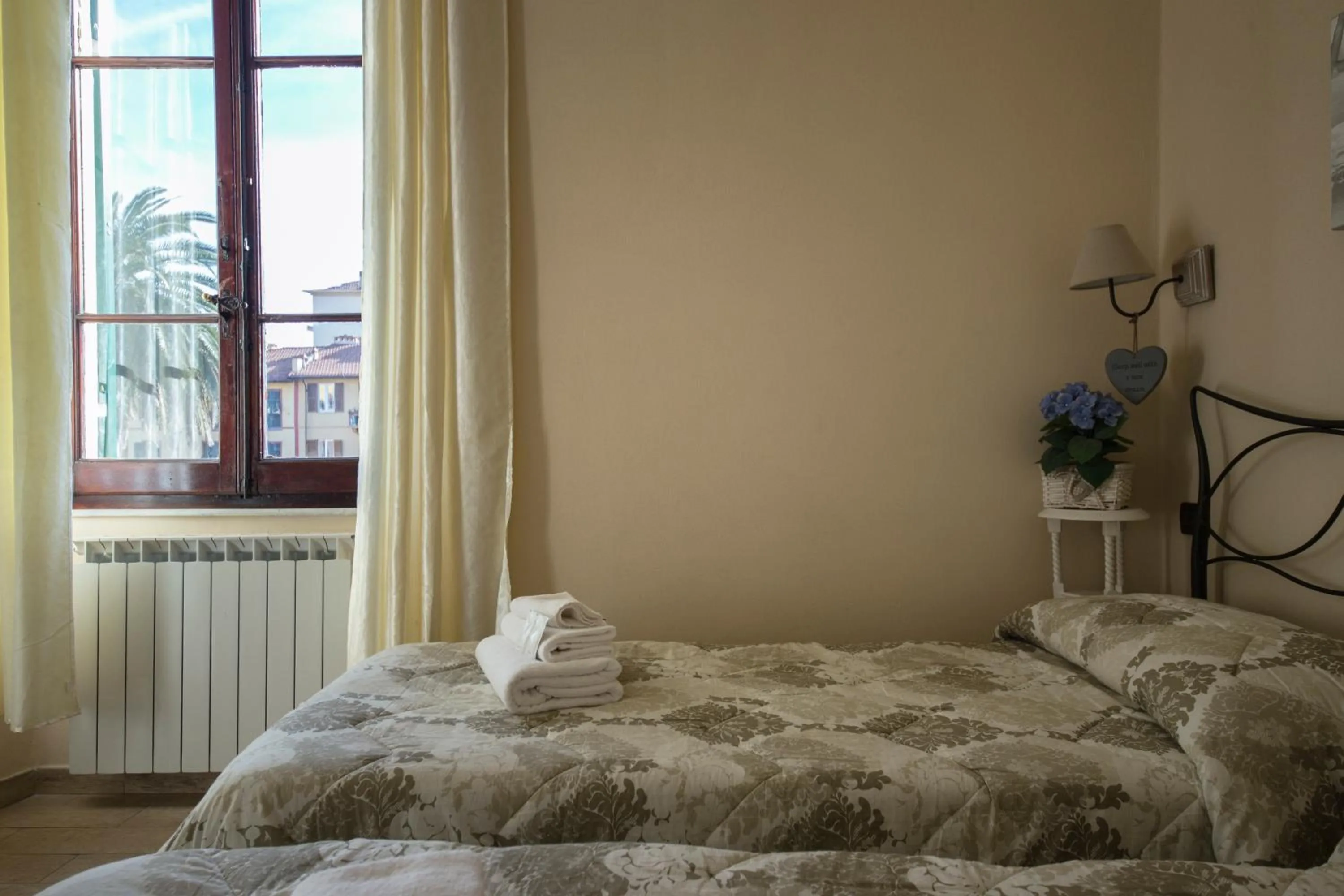 Bed in Affittacamere Lunamar