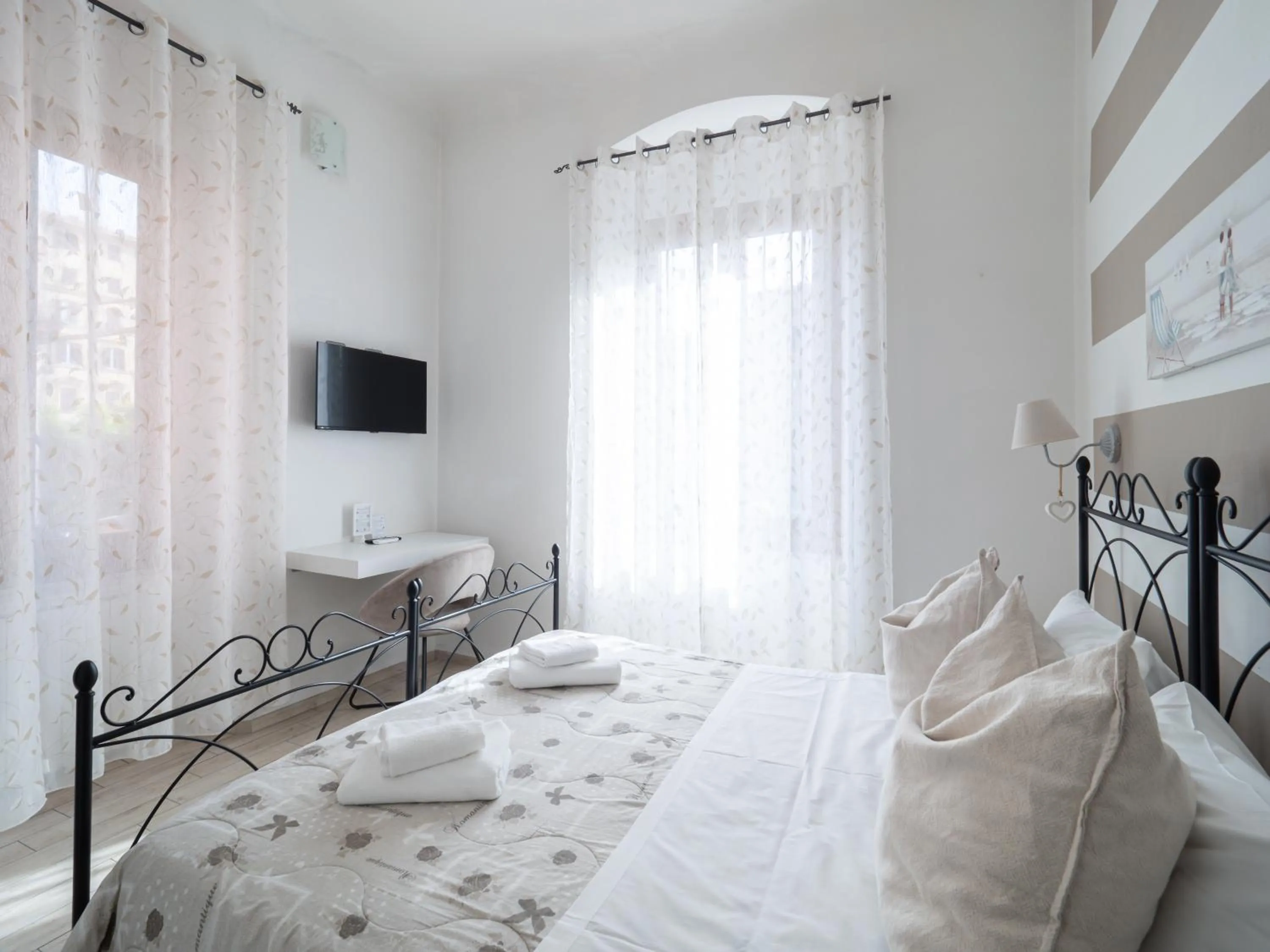 Bed in Affittacamere Lunamar