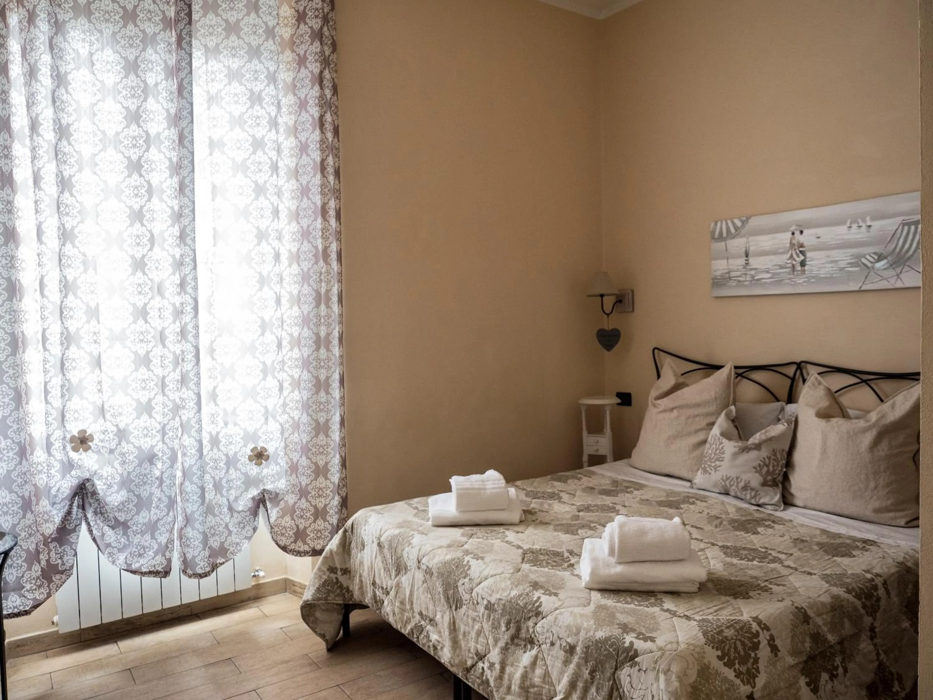 Bed in Affittacamere Lunamar