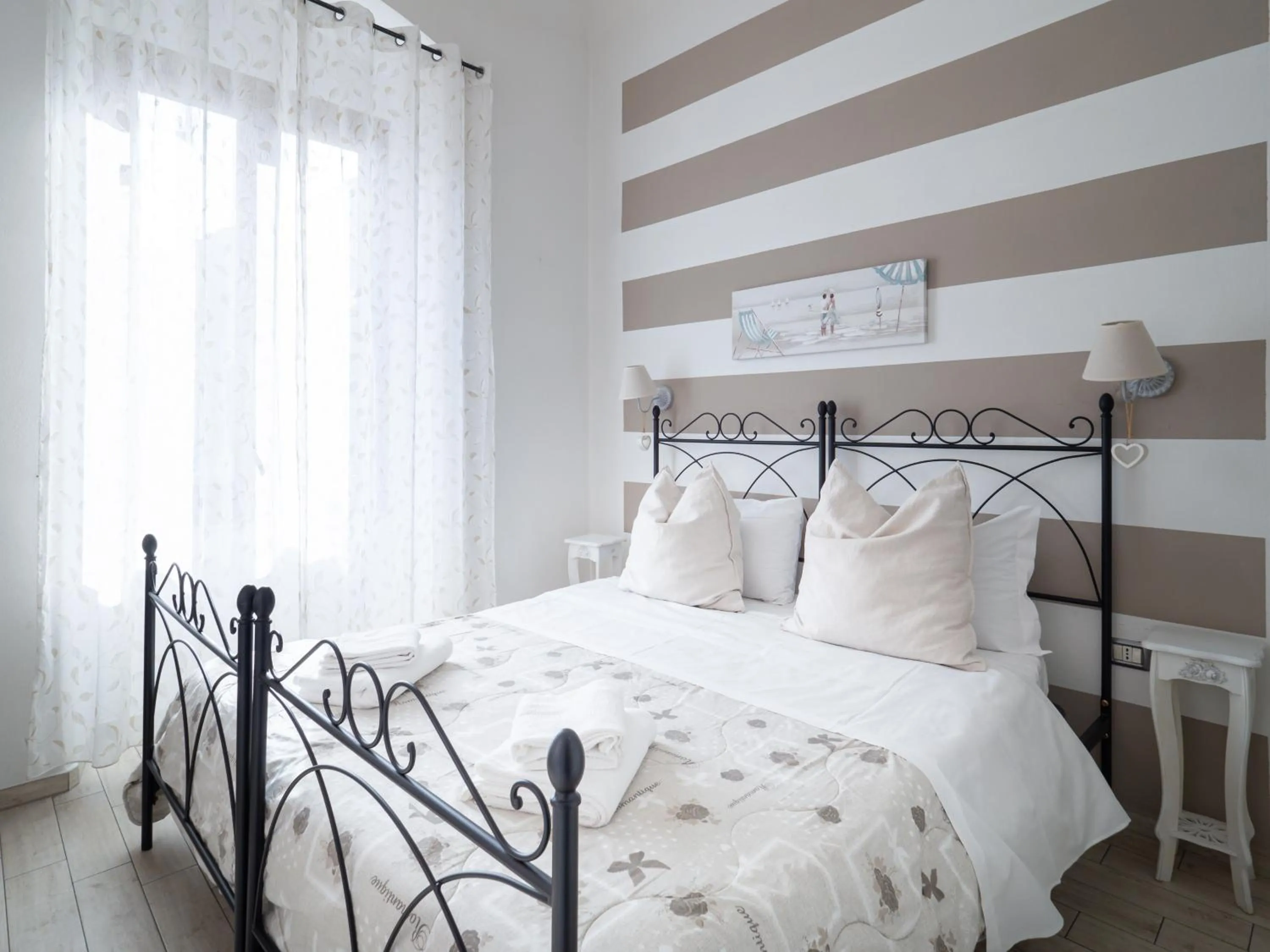 Bed in Affittacamere Lunamar