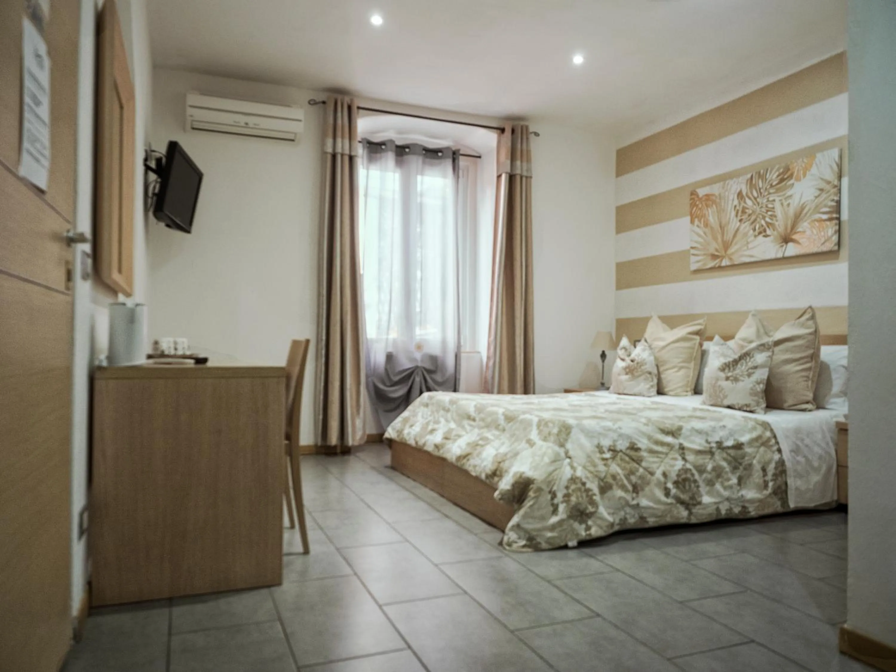 Bed in Affittacamere Lunamar