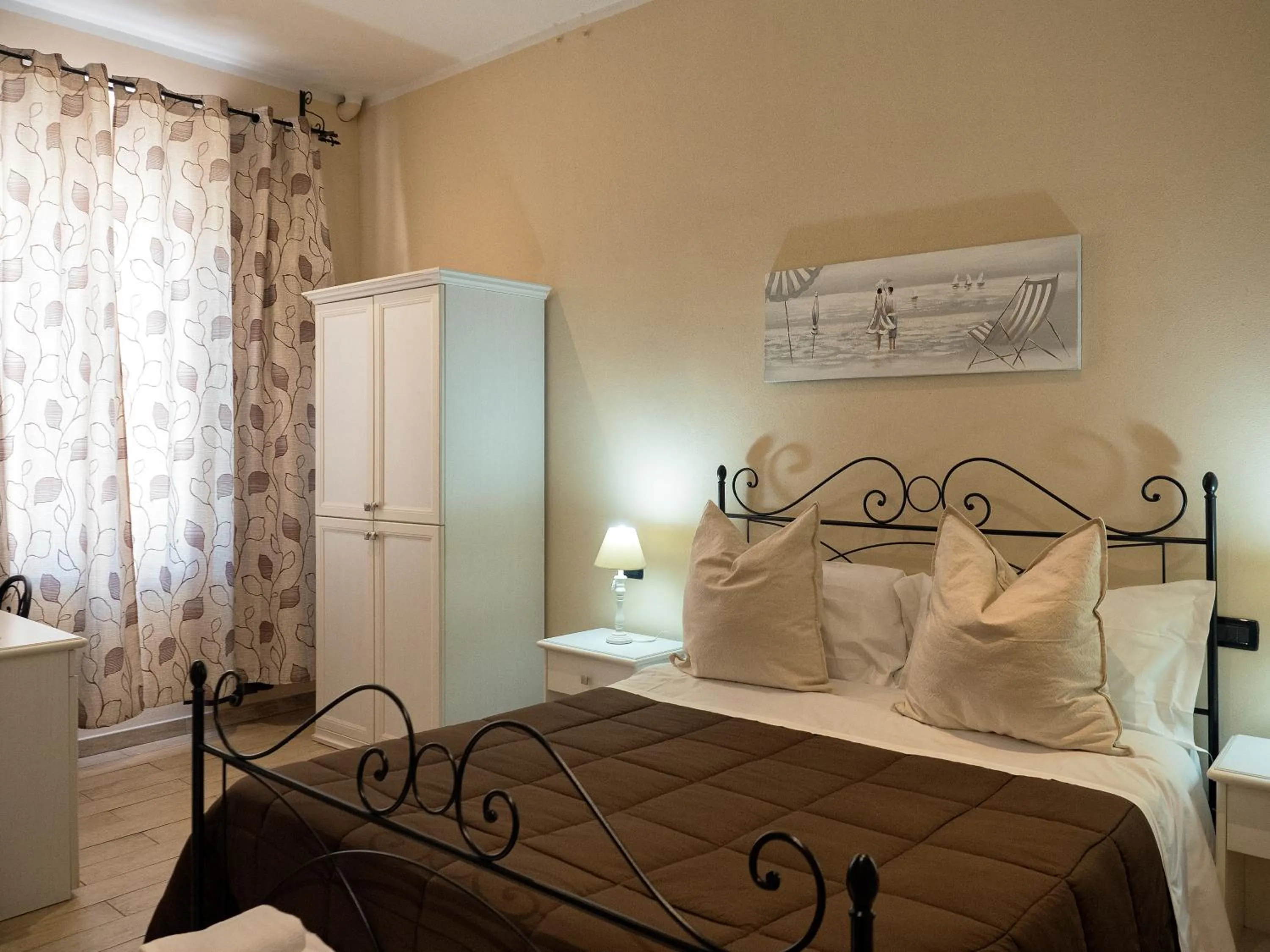 Bed in Affittacamere Lunamar