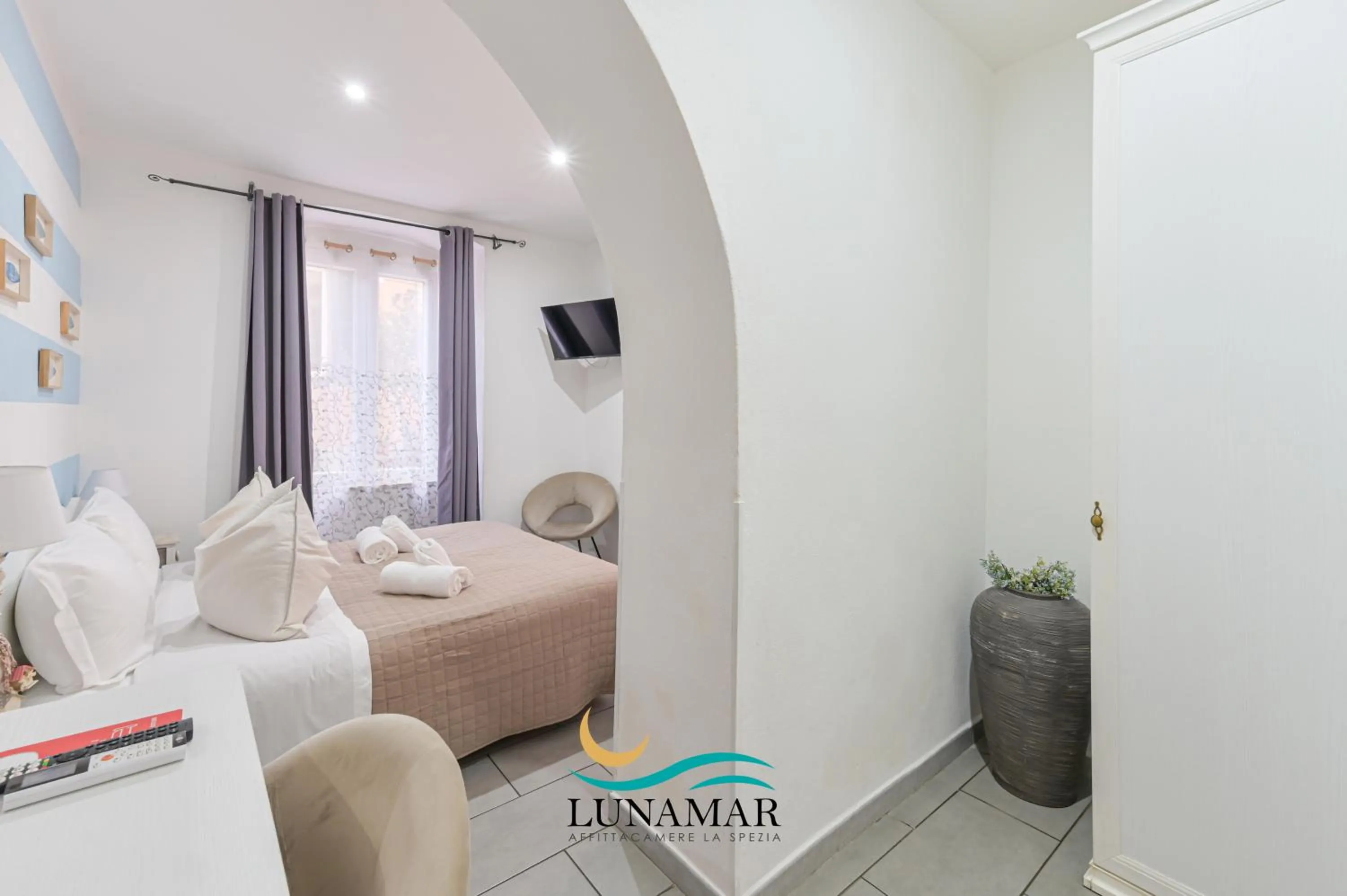 Bed in Affittacamere Lunamar