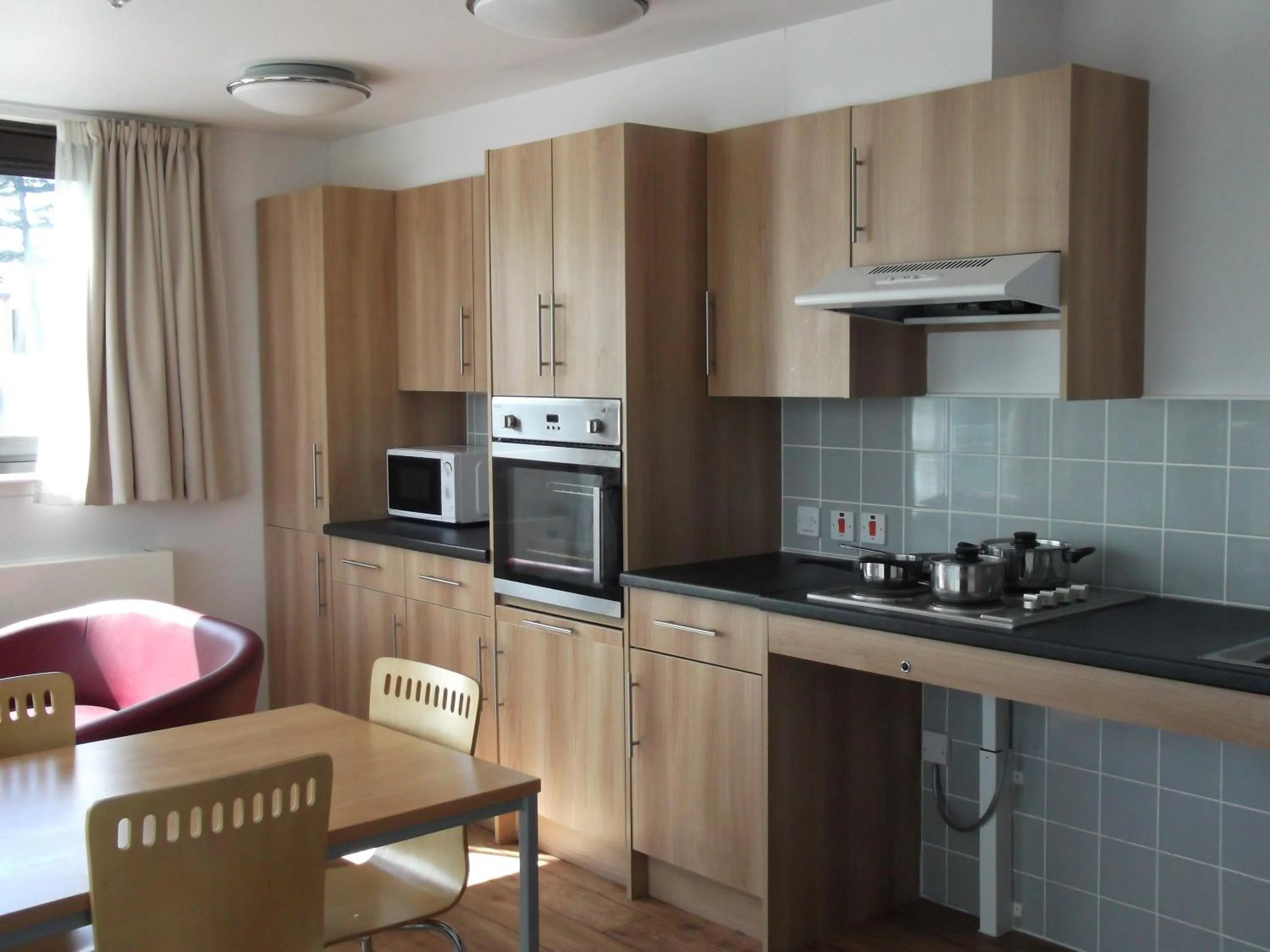 Kitchen or kitchenette in Perth Youth Hostel and Apartments