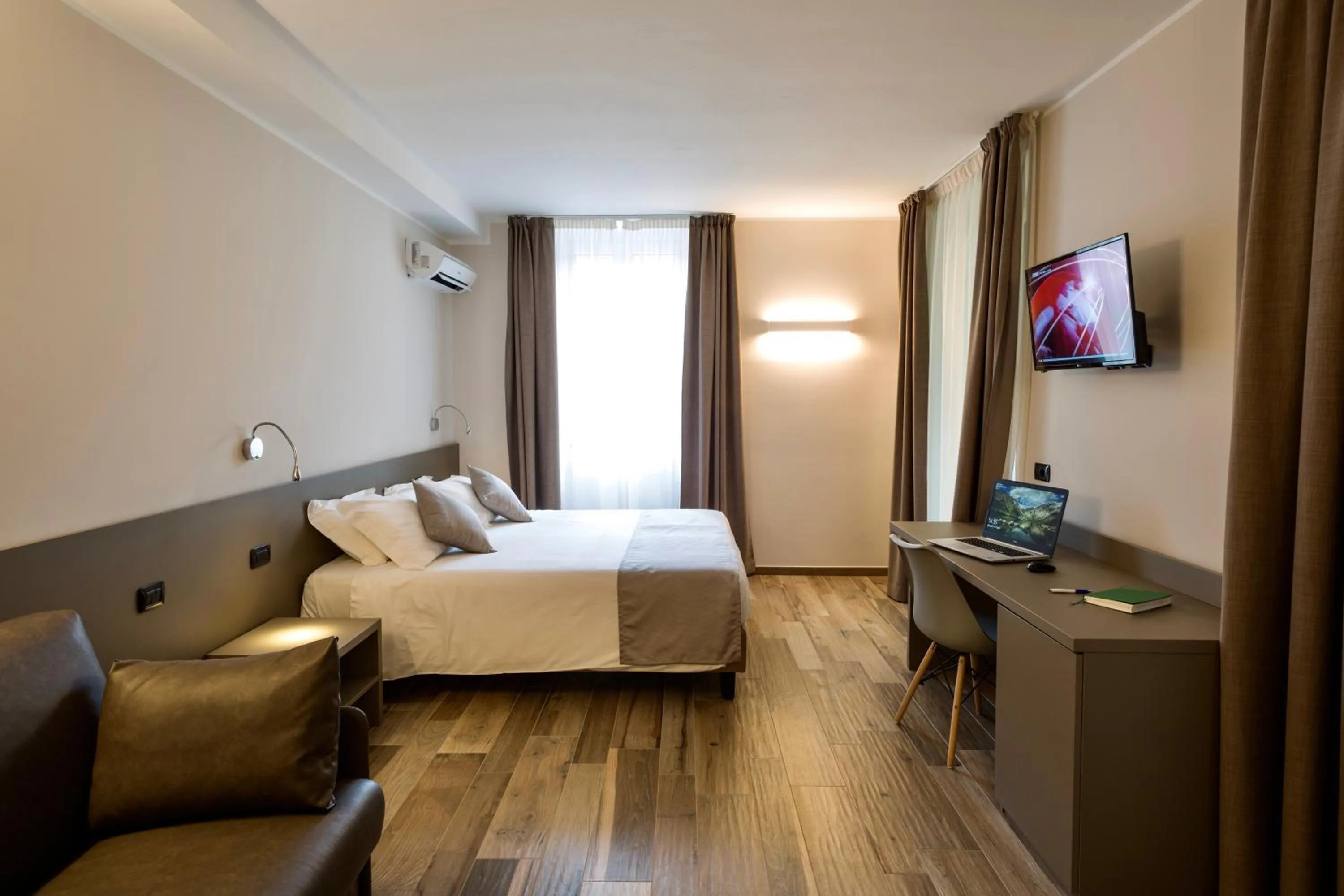 Photo of the whole room, Bed in Hotel Baia di Paré