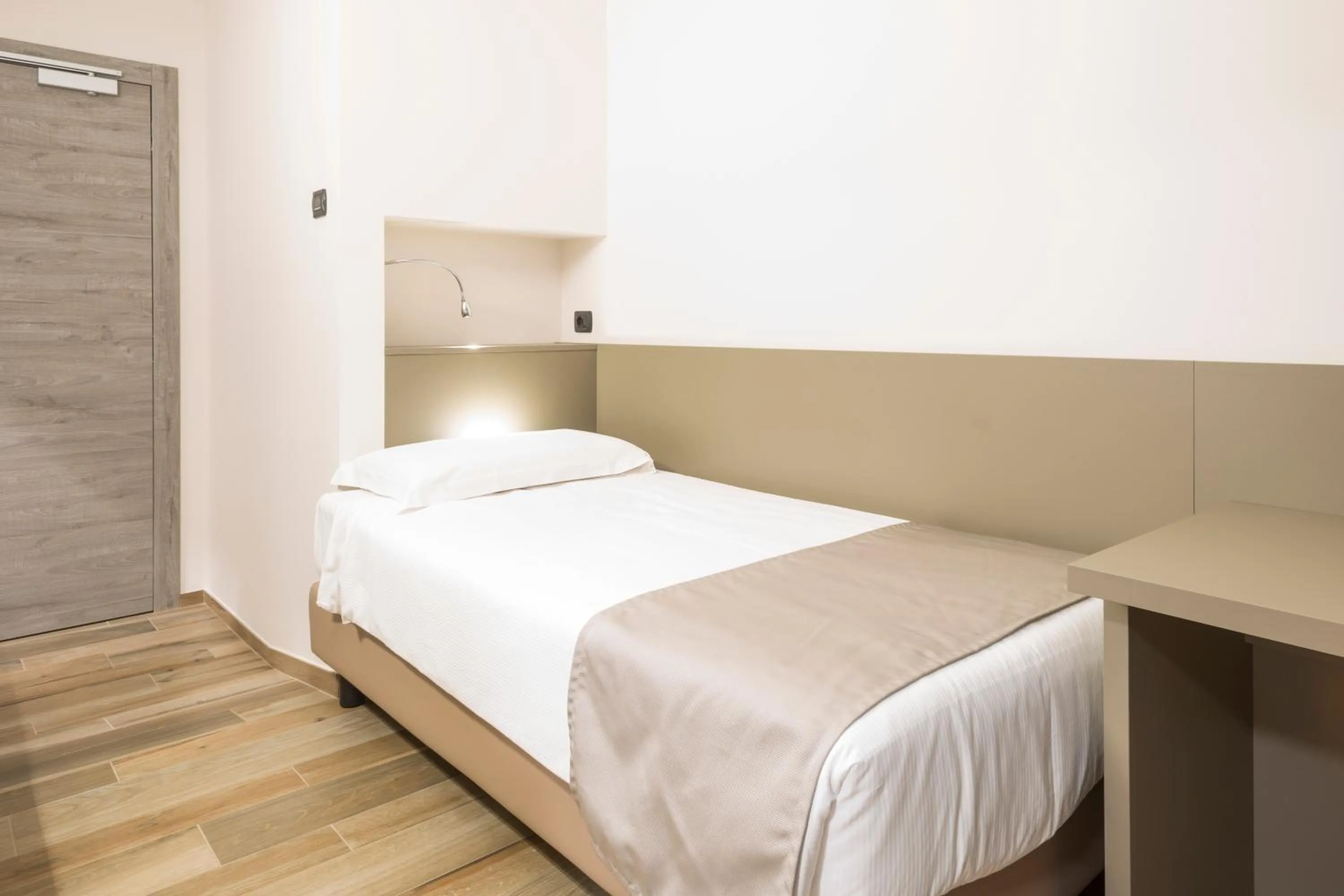 Bed in Hotel Baia di Paré