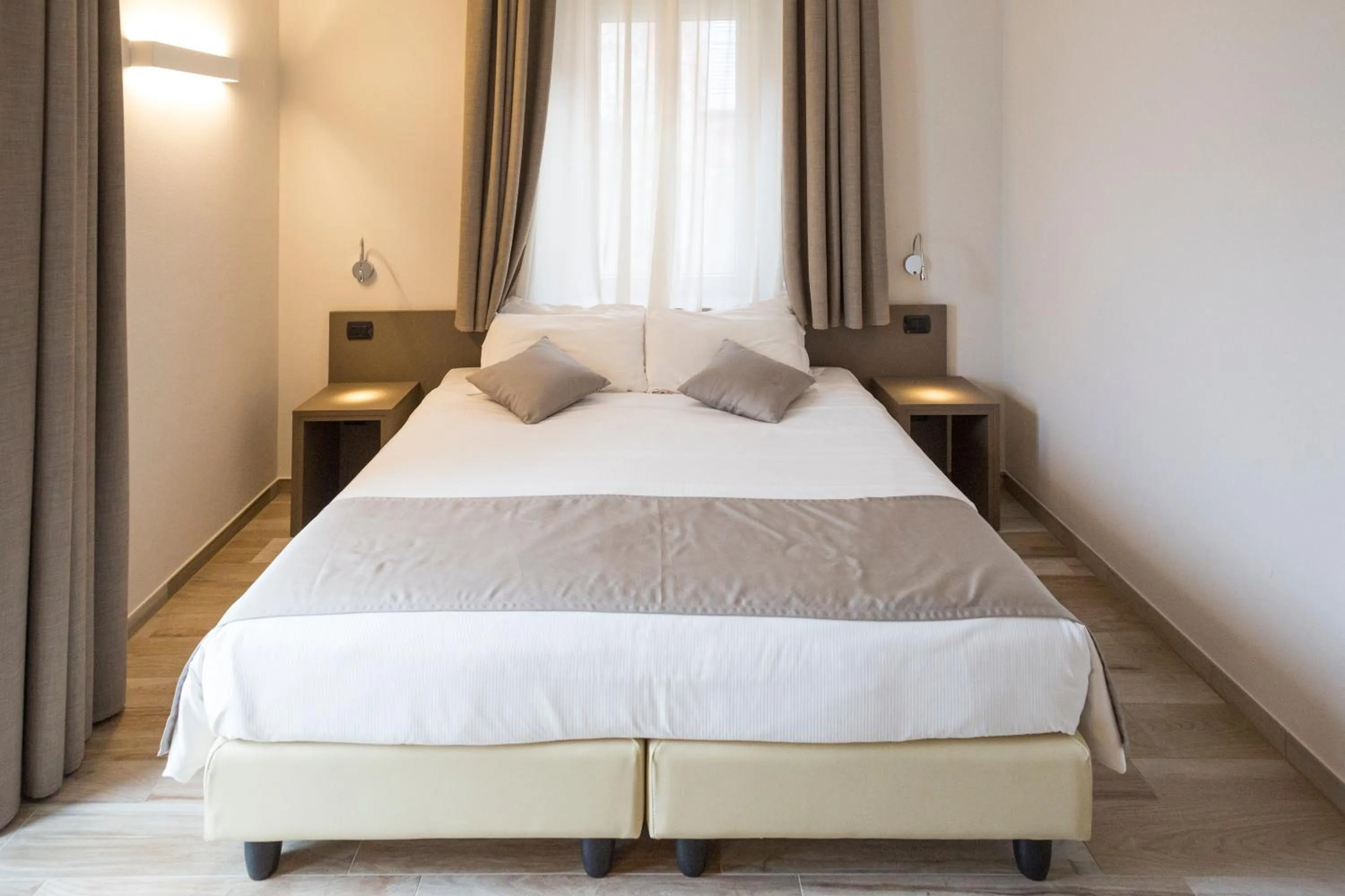 Bed in Hotel Baia di Paré