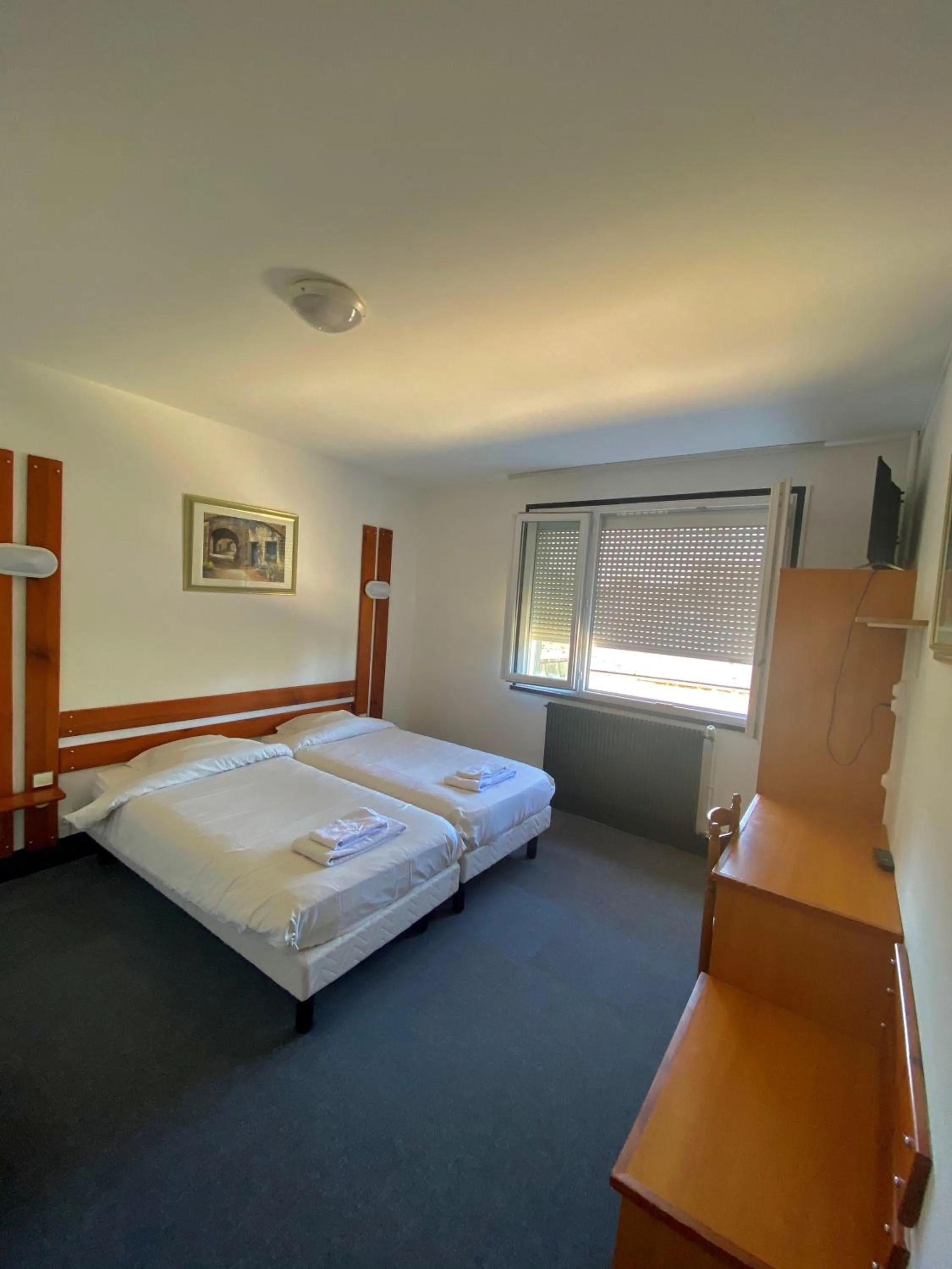 Photo of the whole room, Bed in Hotel du Centre Lucé Chartres