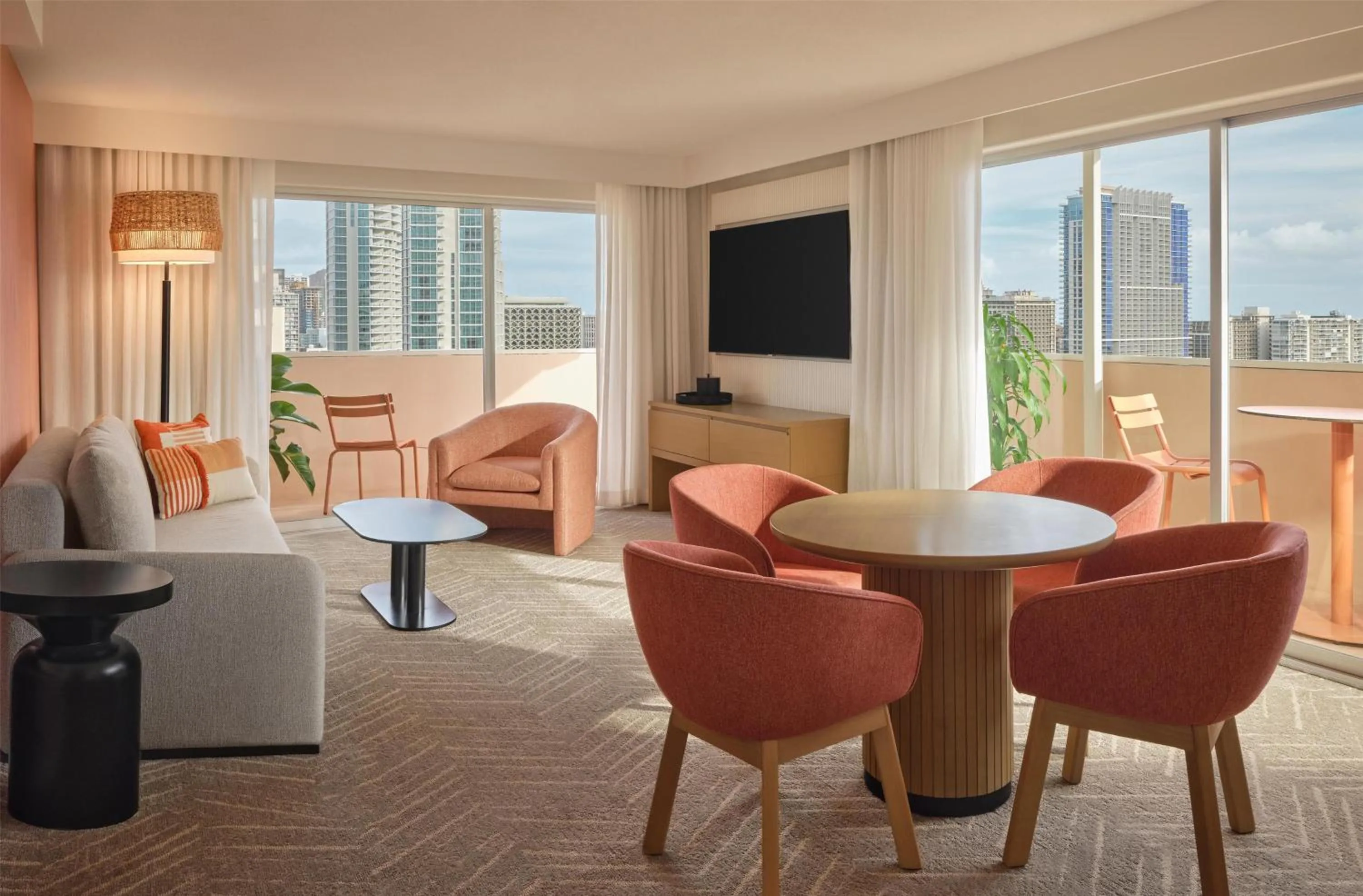 Living room in The Ambassador of Waikiki, Tapestry Collection by Hilton